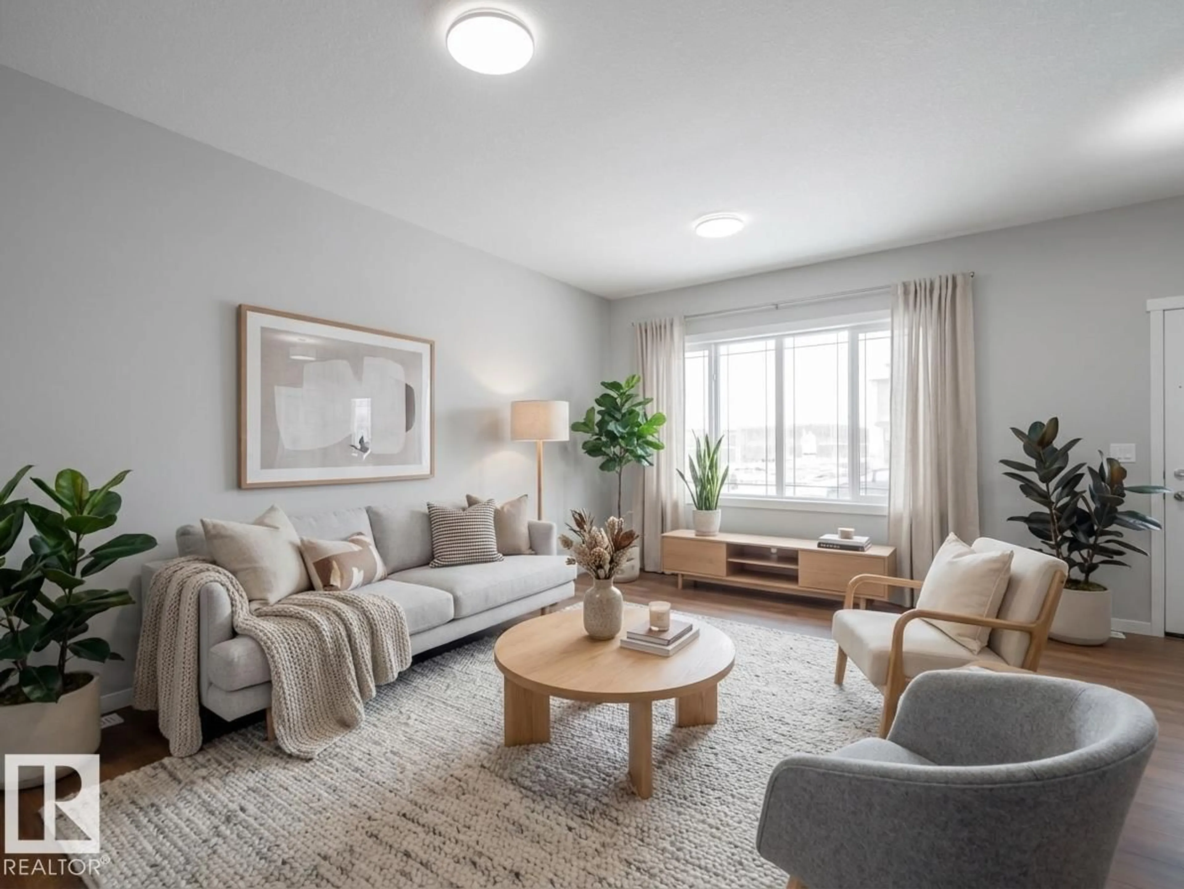 Living room with furniture, unknown for 1040 14 AV, Edmonton Alberta T6T2W7