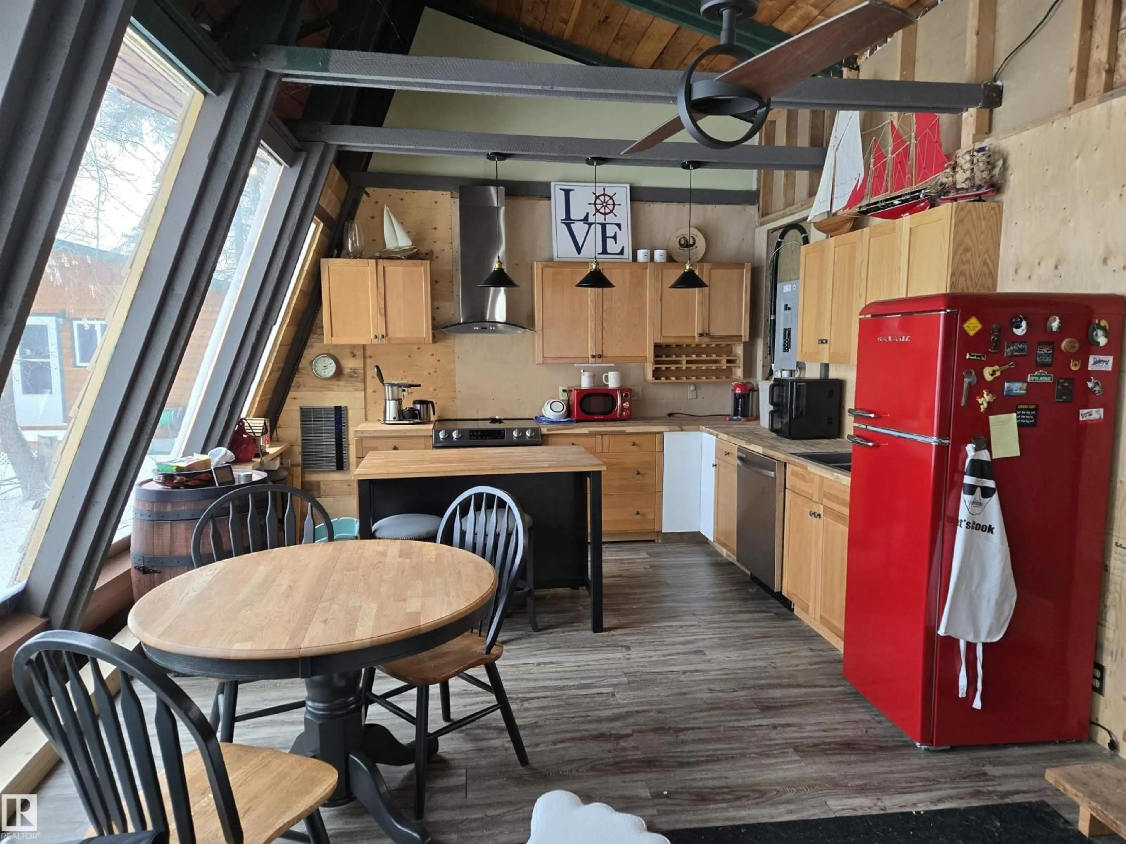 Open concept kitchen, wood/laminate floor for 5 CONIFER CR, Rural Lac Ste. Anne County Alberta T0E0V0