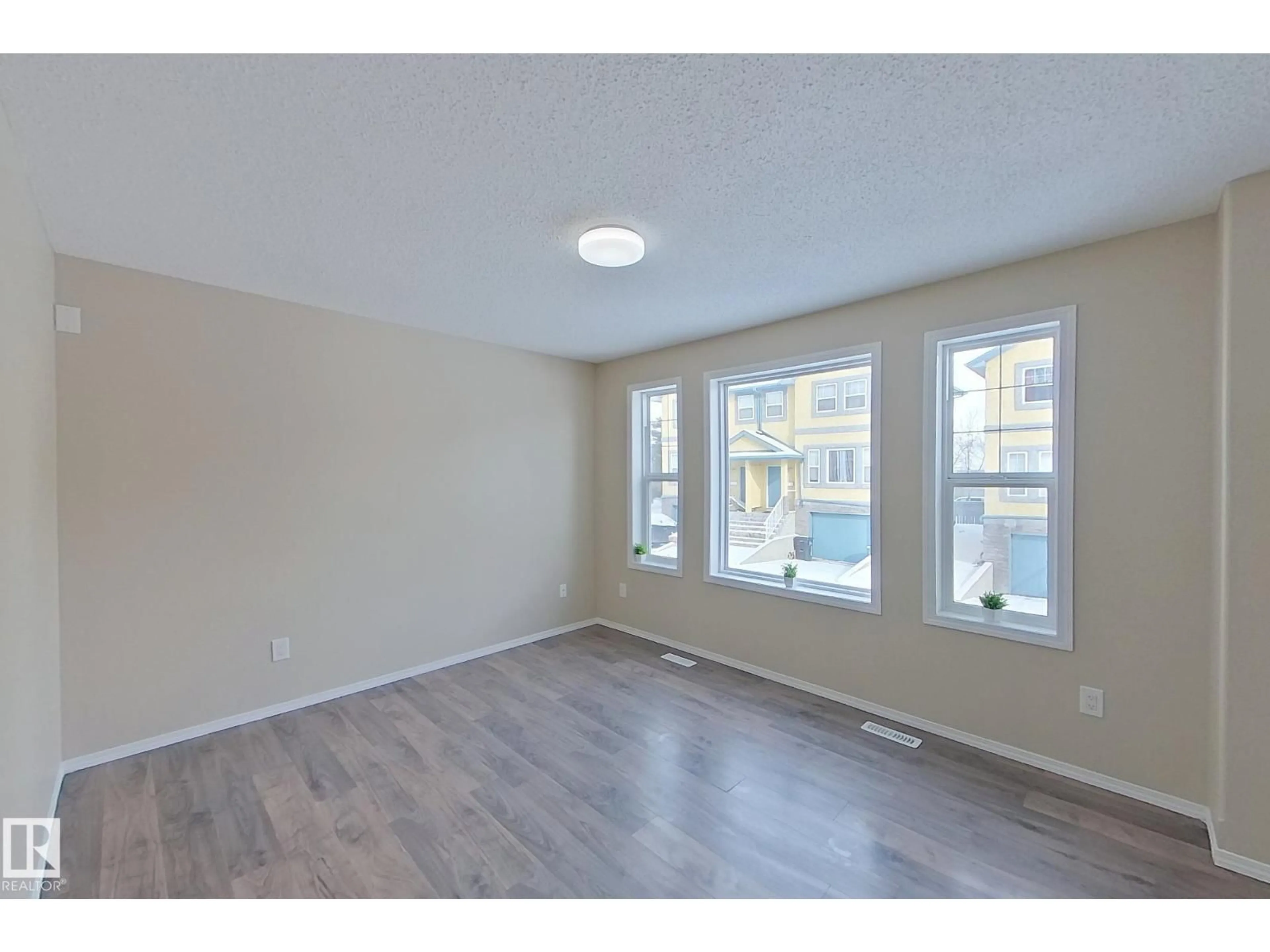A pic of a room for 3 - 16777 91 ST, Edmonton Alberta T5Z3X4