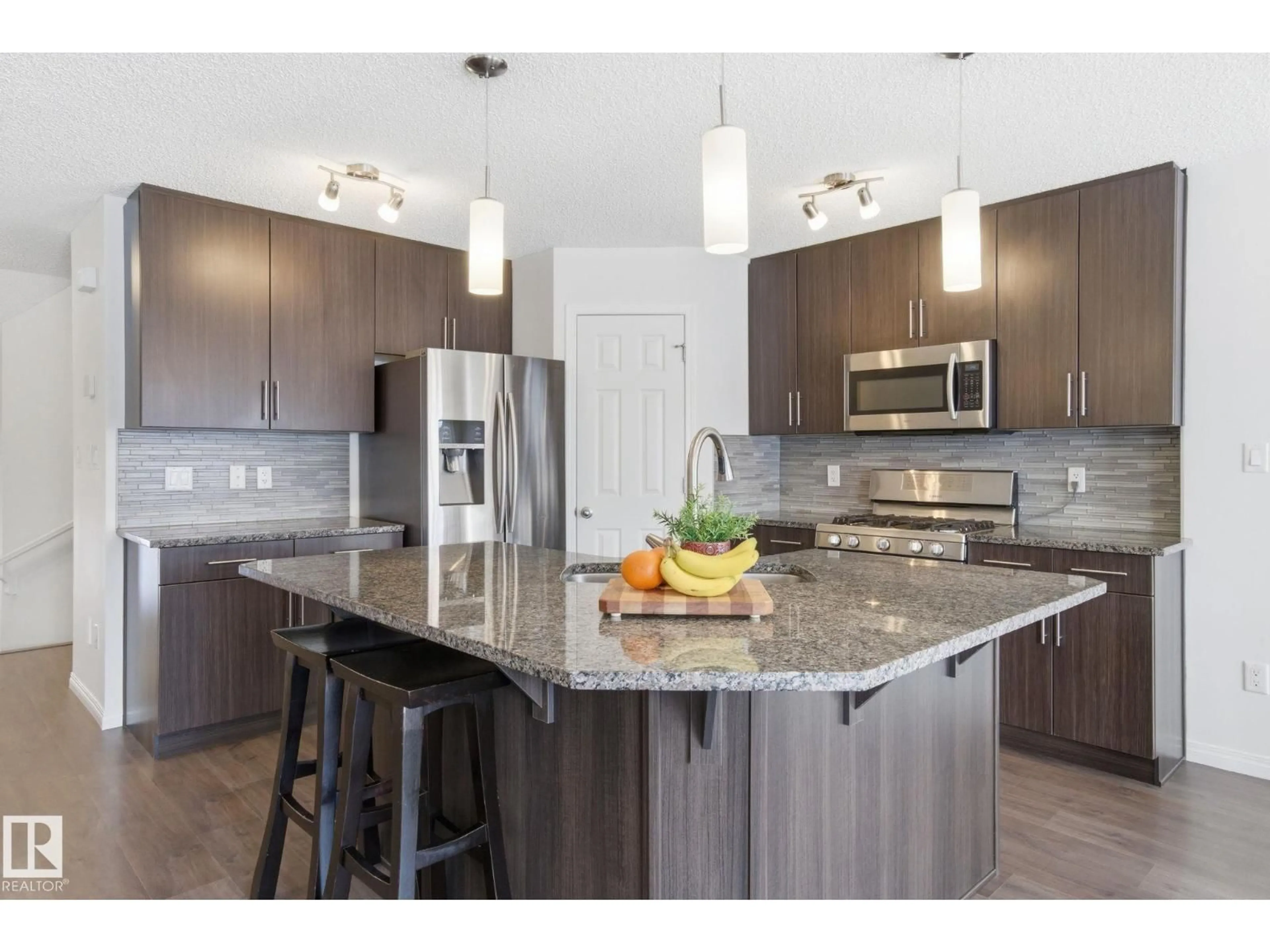 Open concept kitchen, unknown for 2553 COUGHLAN RD, Edmonton Alberta T6W2Z6