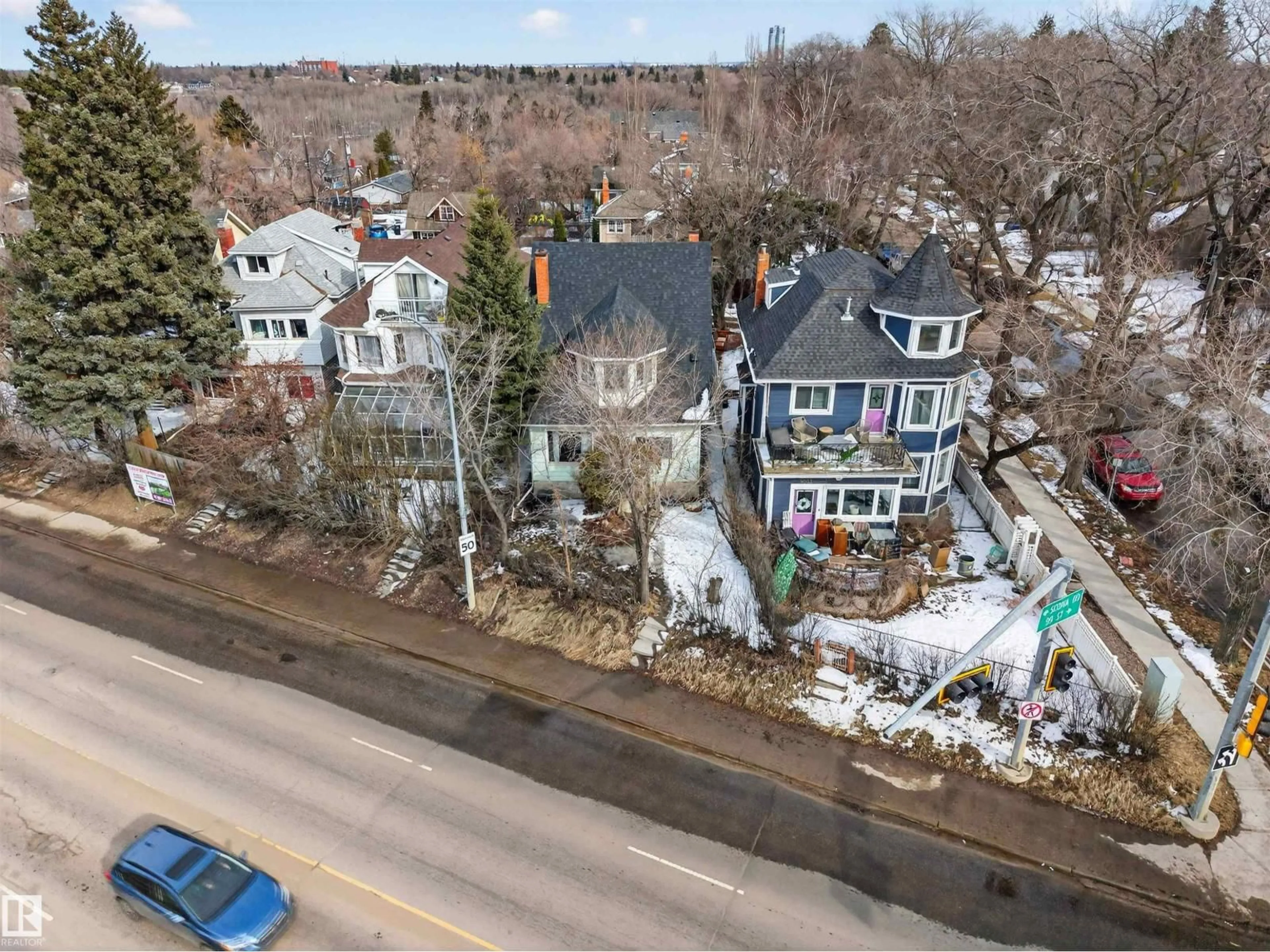 A pic from outside/outdoor area/front of a property/back of a property/a pic from drone, street for 9205 99 ST, Edmonton Alberta T6E3W1