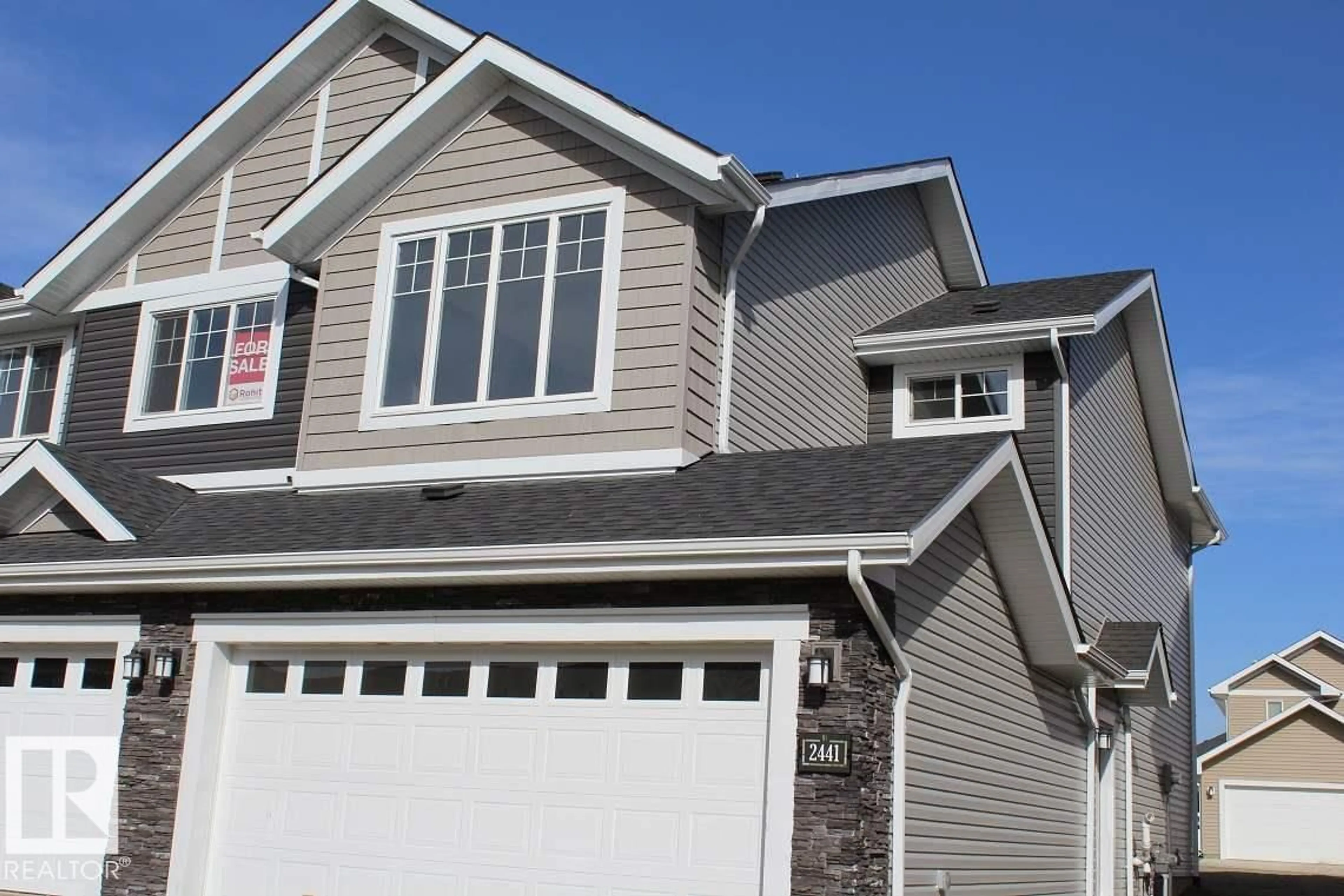 Home with vinyl exterior material, street for 2441 GLENRIDDING BV, Edmonton Alberta T6W2T4