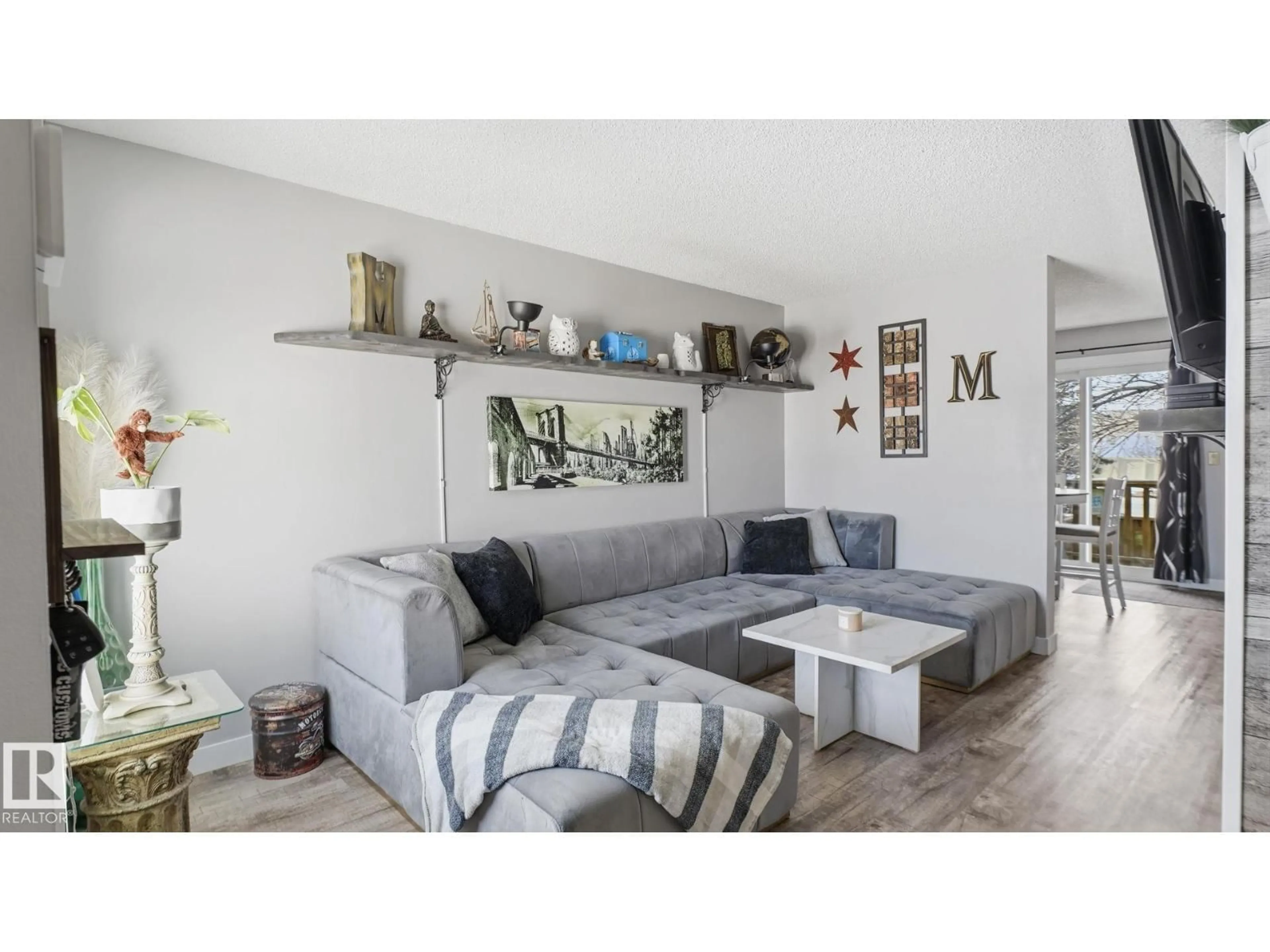 Living room with furniture, wood/laminate floor for #5 - 10 RITCHIE WY, Sherwood Park Alberta T8A5R1