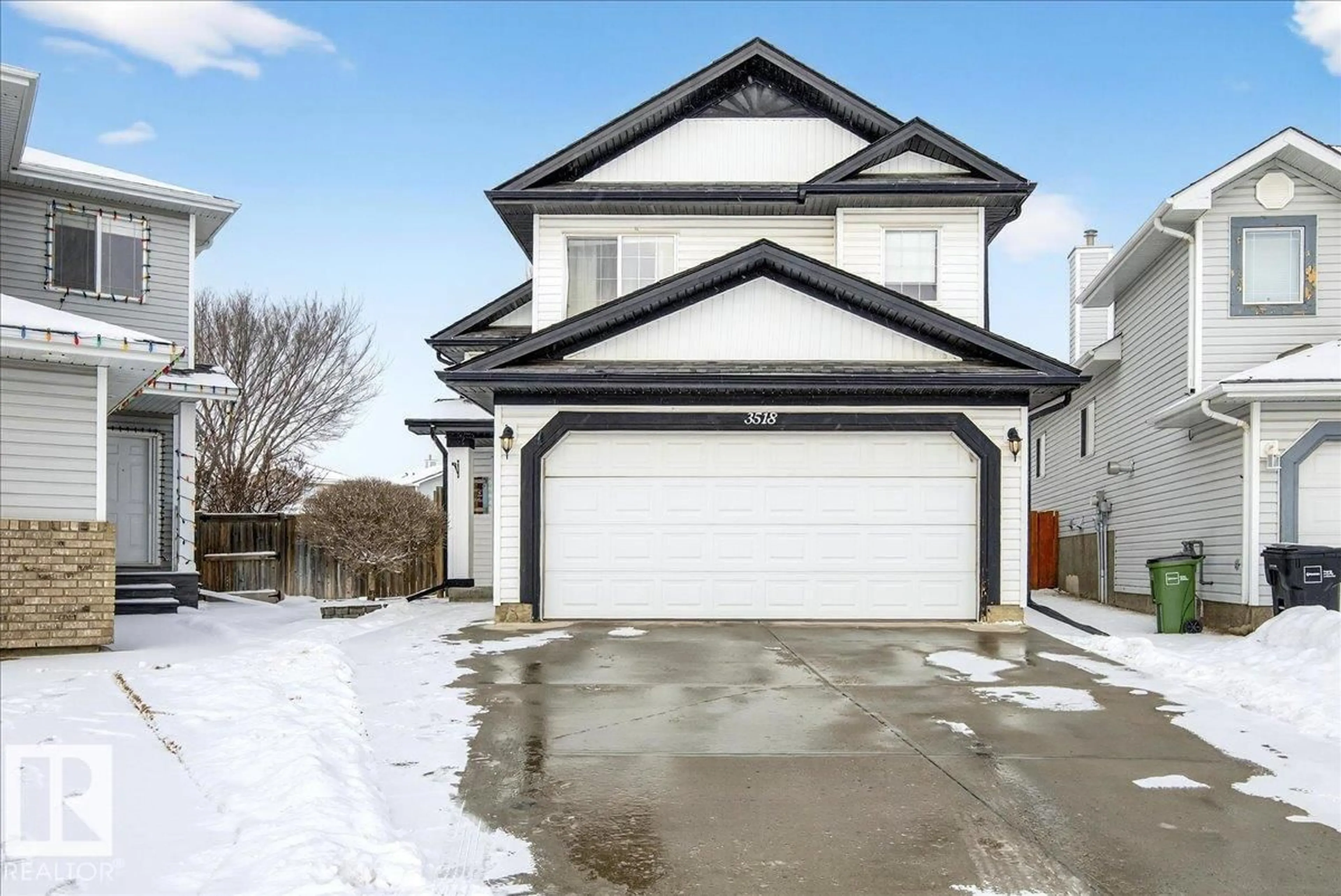 Home with vinyl exterior material, street for 3518 18 ST, Edmonton Alberta T6T1Z1