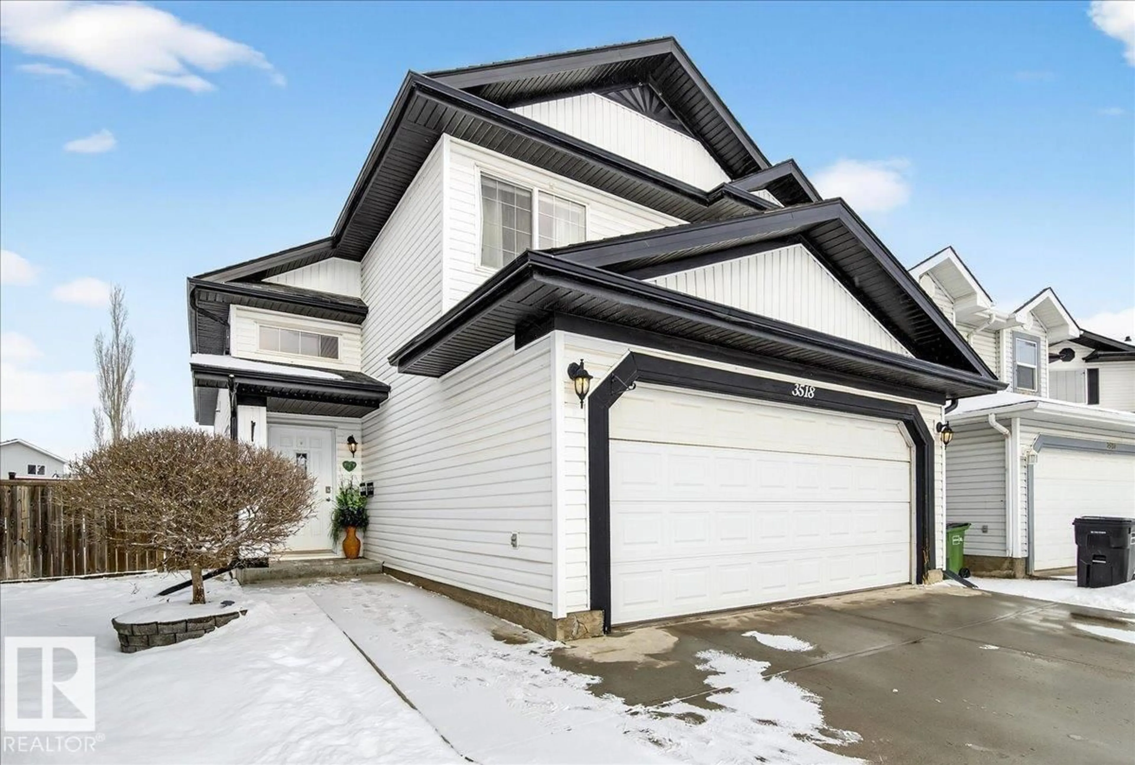 Home with vinyl exterior material, street for 3518 18 ST, Edmonton Alberta T6T1Z1