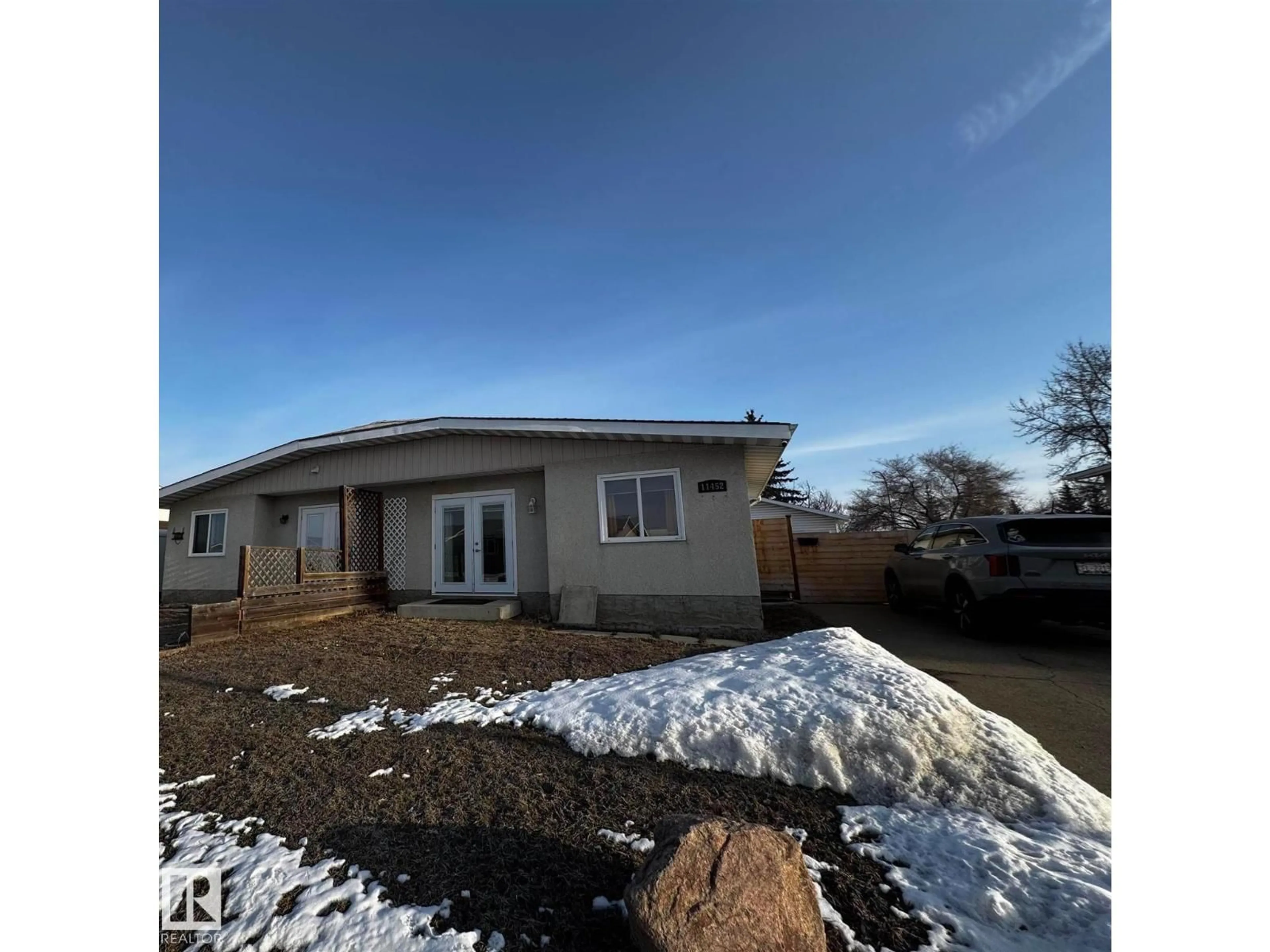 A pic from outside/outdoor area/front of a property/back of a property/a pic from drone, building for 11452 152B AV, Edmonton Alberta T5X1E8