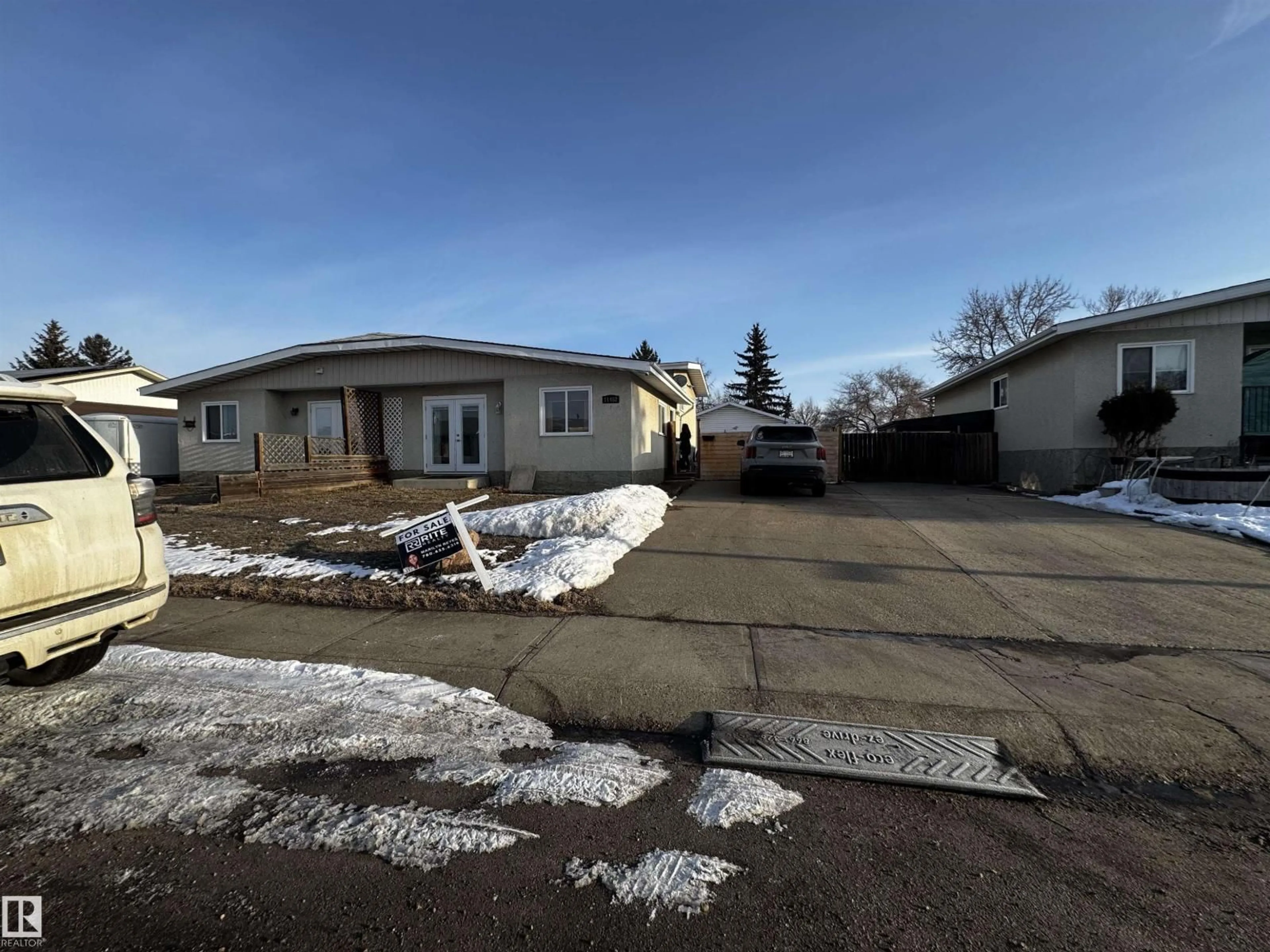 A pic from outside/outdoor area/front of a property/back of a property/a pic from drone, street for 11452 152B AV, Edmonton Alberta T5X1E8
