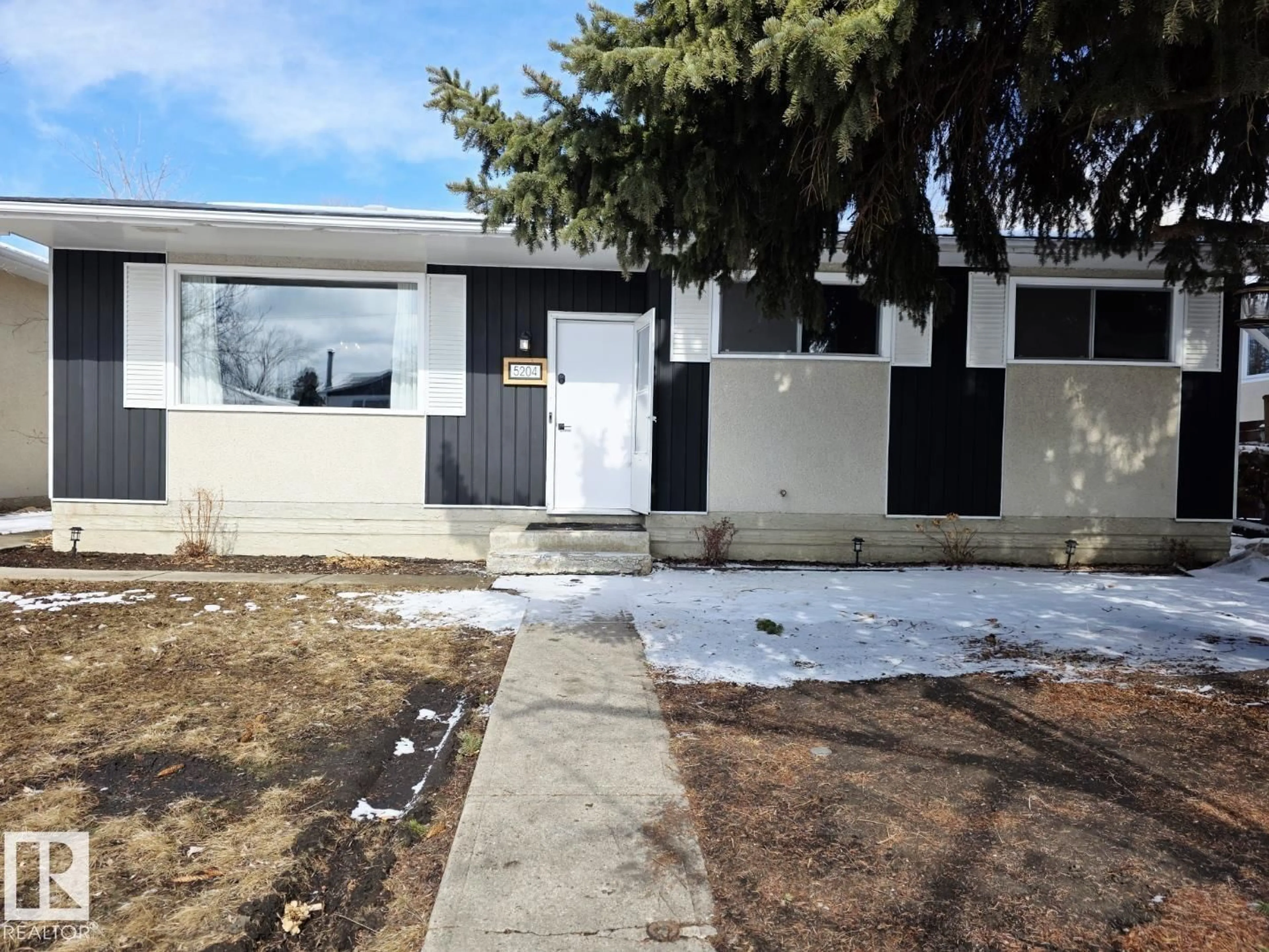 Home with vinyl exterior material, street for 5204 43 AV, Leduc Alberta T9E5A6