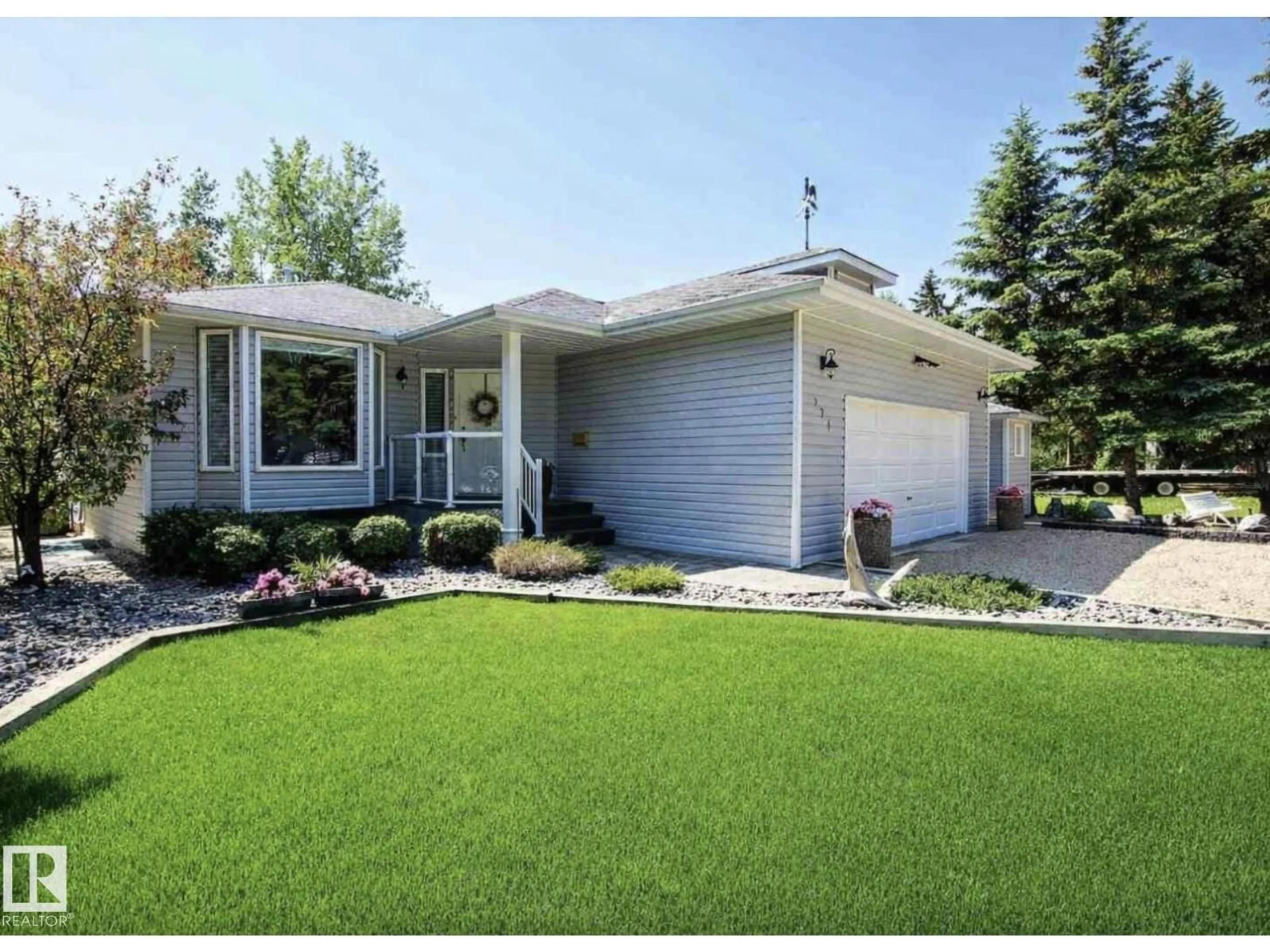 Home with vinyl exterior material, street for 978 9 STREET, Rural Lac Ste. Anne County Alberta T0E1A0