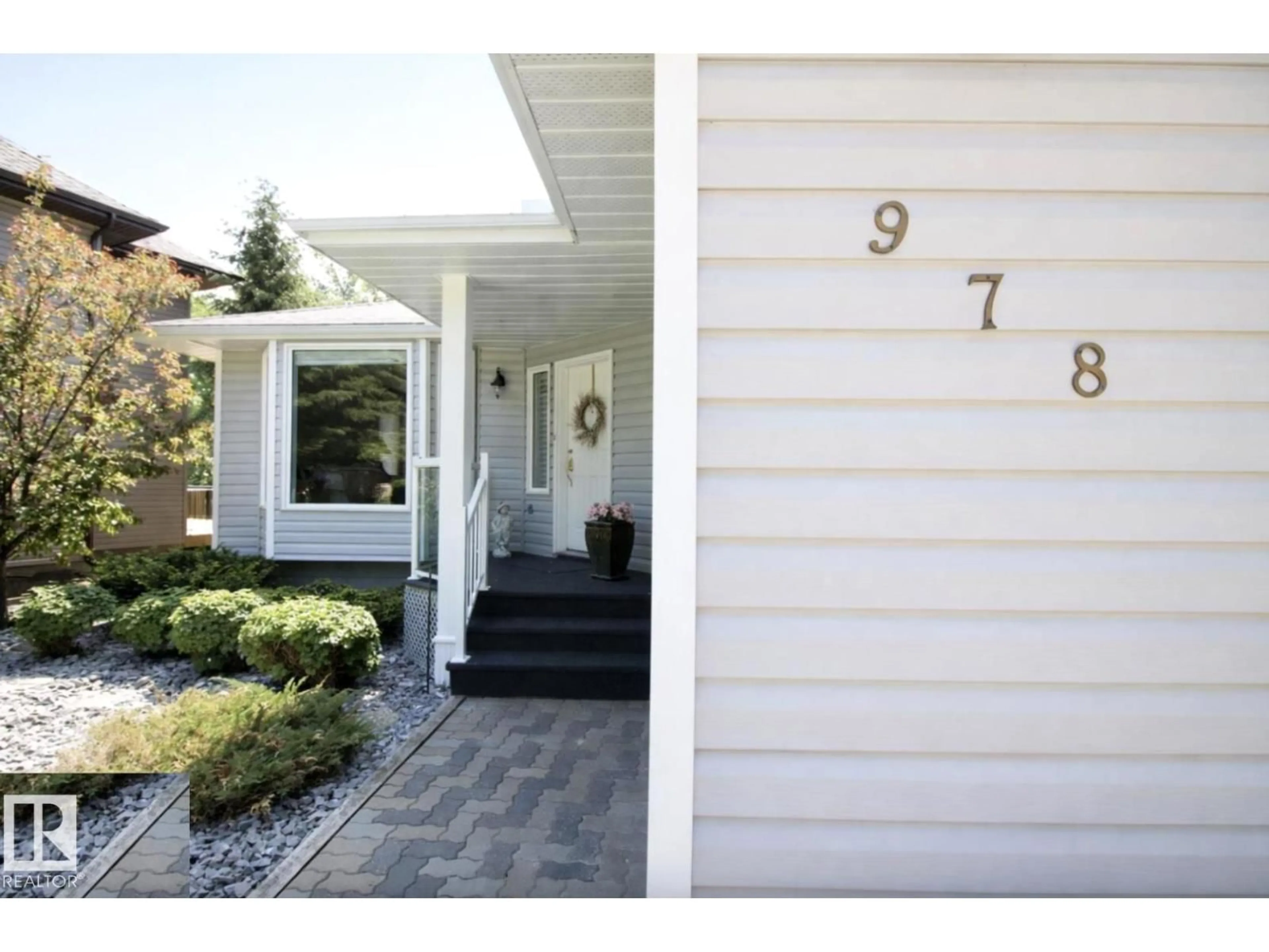 Home with vinyl exterior material, street for 978 9 STREET, Rural Lac Ste. Anne County Alberta T0E1A0