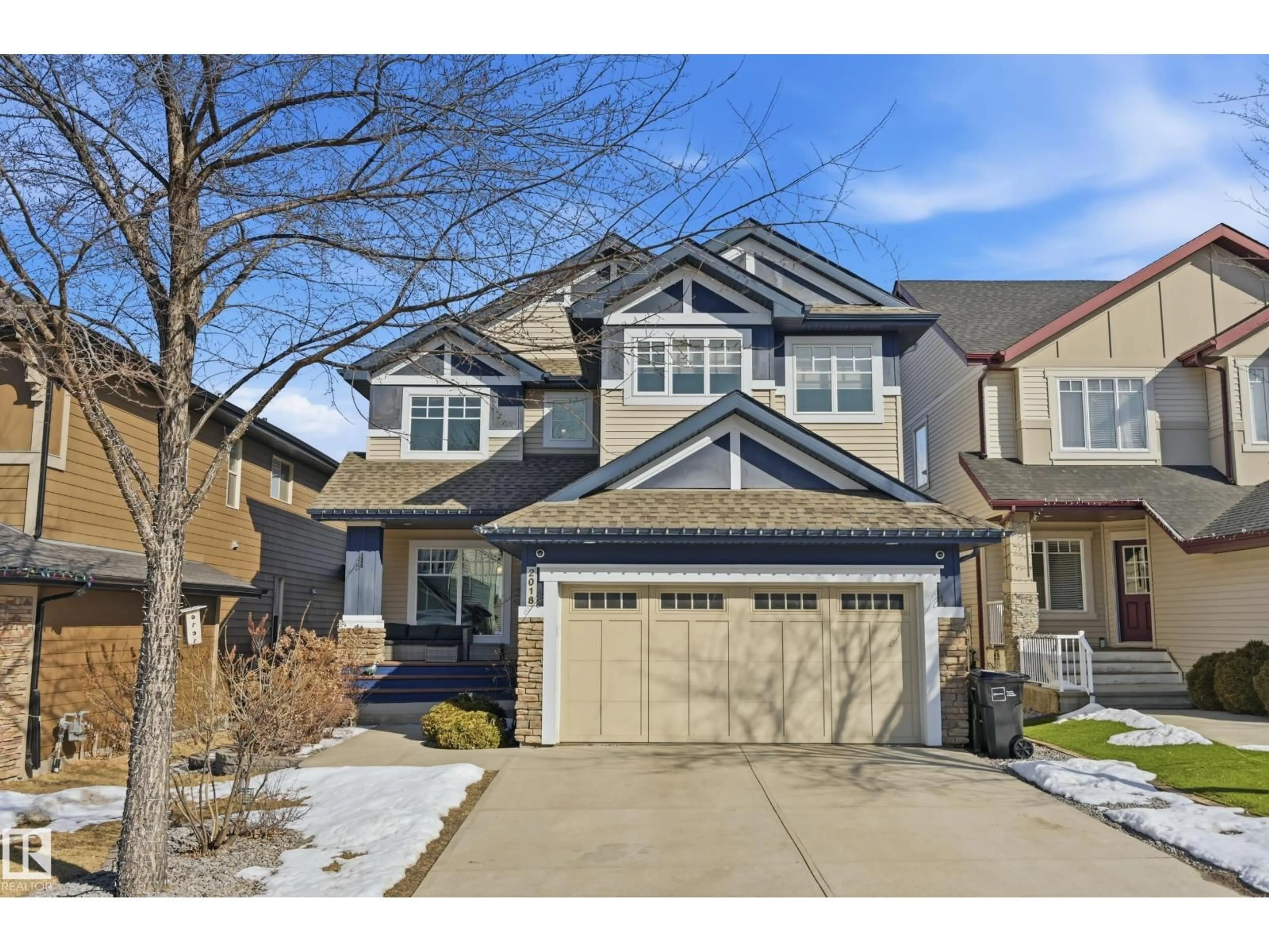 Home with vinyl exterior material, street for 2018 ARMITAGE GR SW, Edmonton Alberta T6W0K8