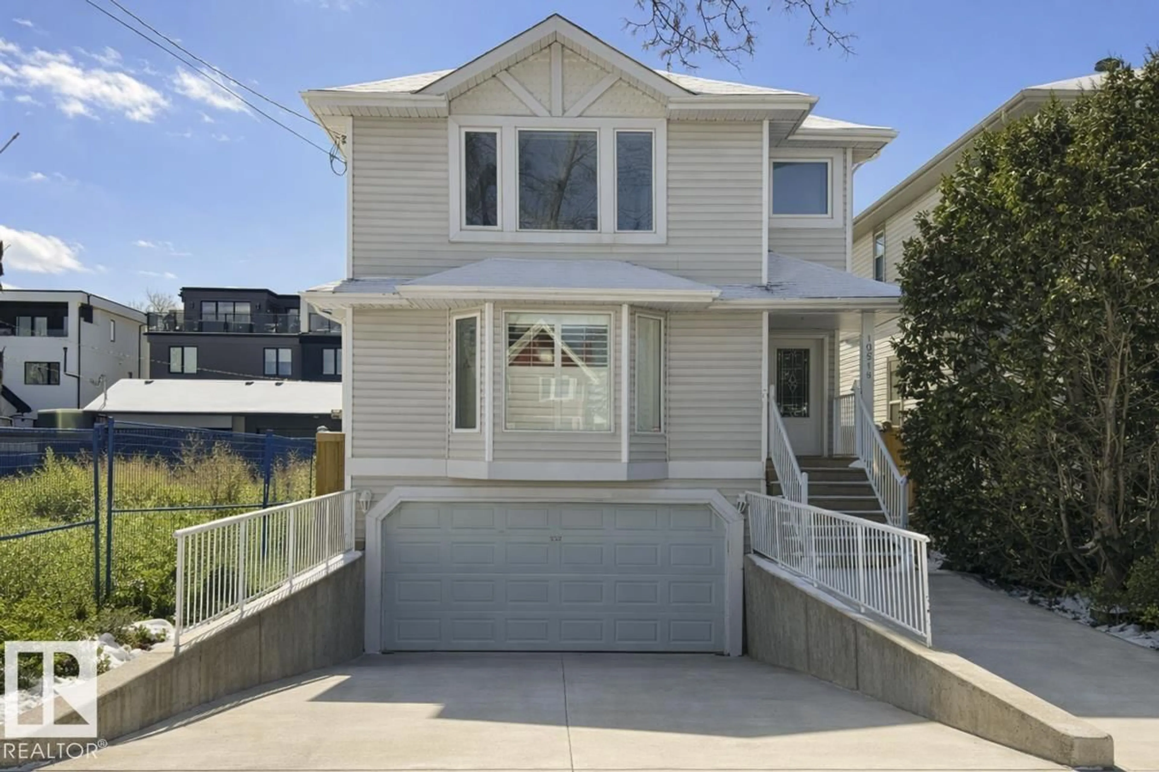 Home with vinyl exterior material, street for NW - 10519 87 AV, Edmonton Alberta T6E2P6