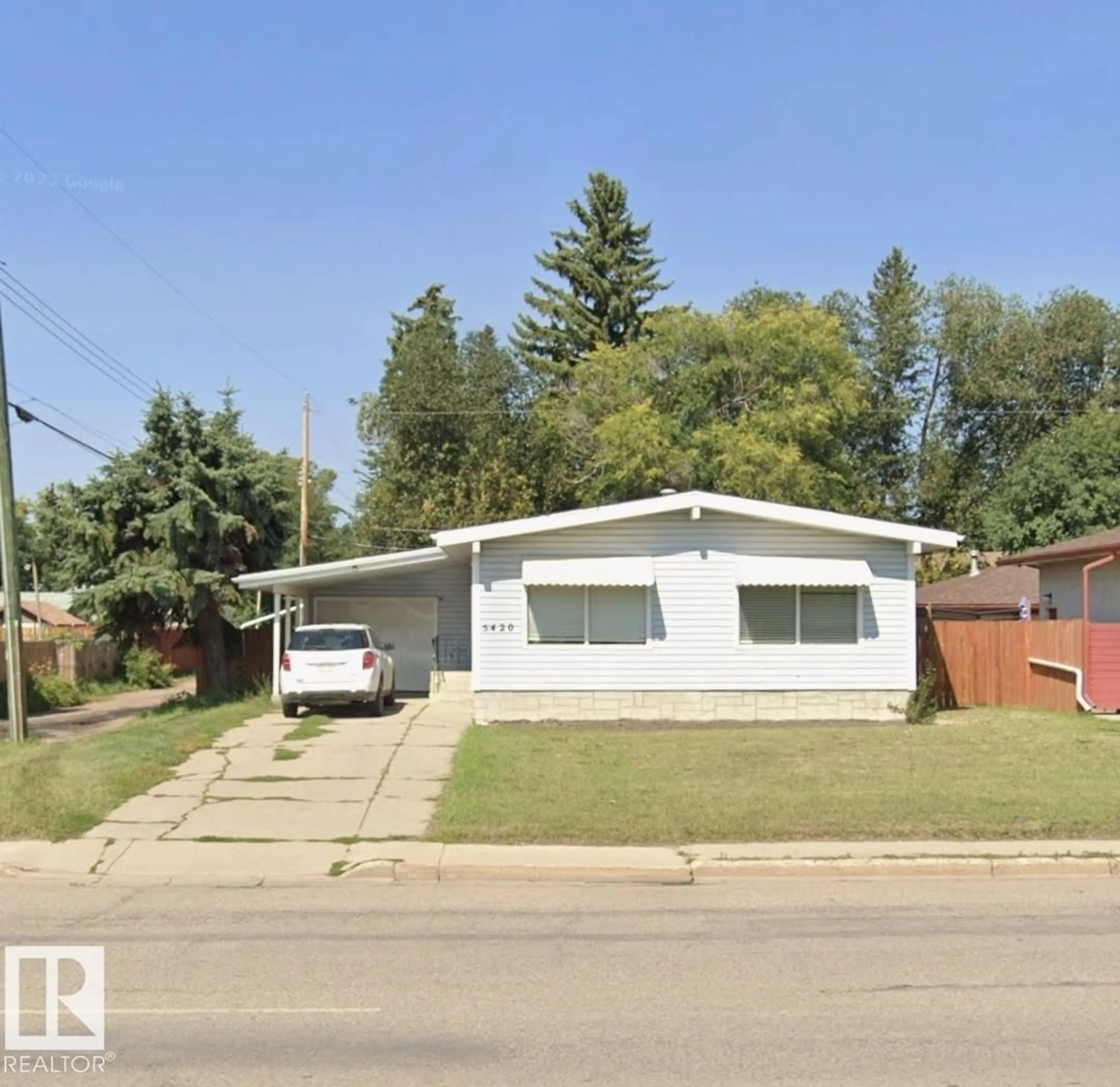 Home with vinyl exterior material, street for 5420 40 AV, Wetaskiwin Alberta T9A0A5