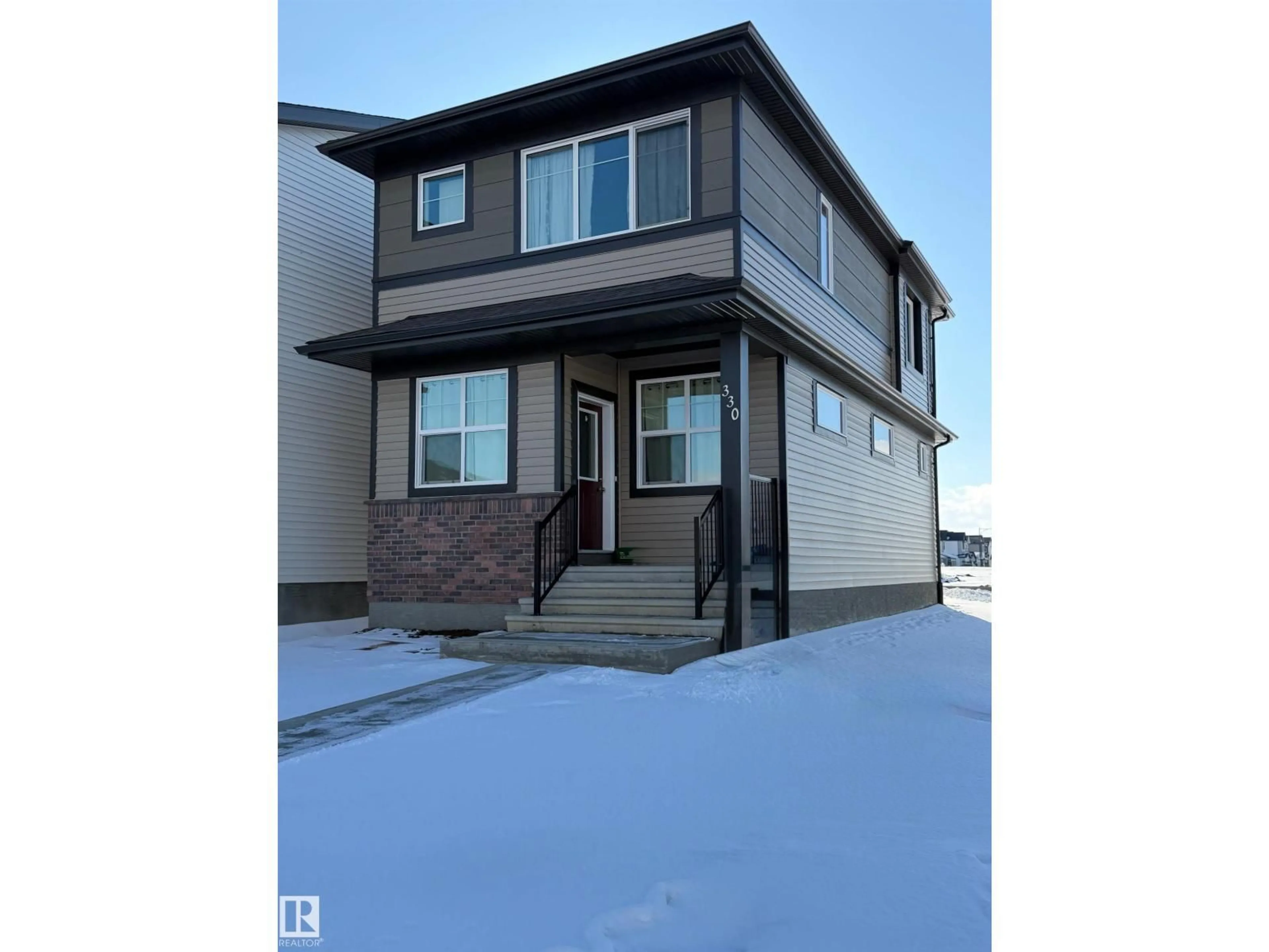 Home with vinyl exterior material, street for 330 EDGEMONT DR, Edmonton Alberta T6M3G7