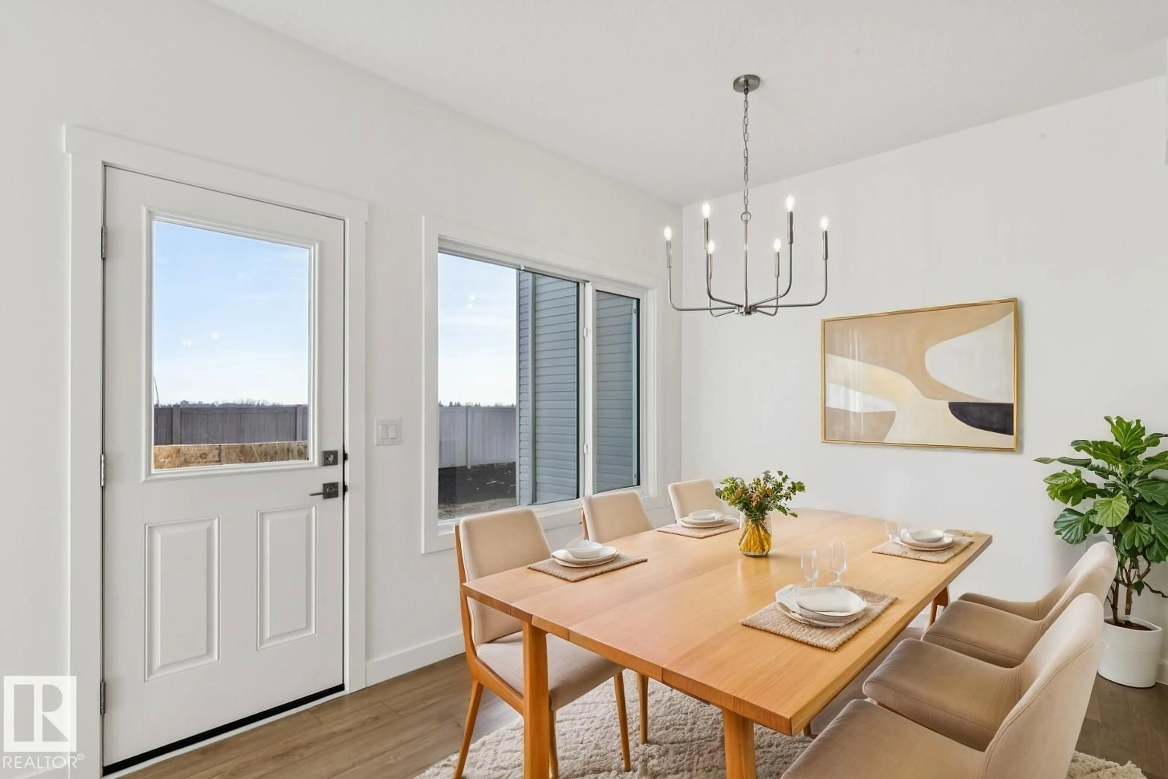 Dining room, wood/laminate floor for NW - 4015 207 ST, Edmonton Alberta T6M3G1