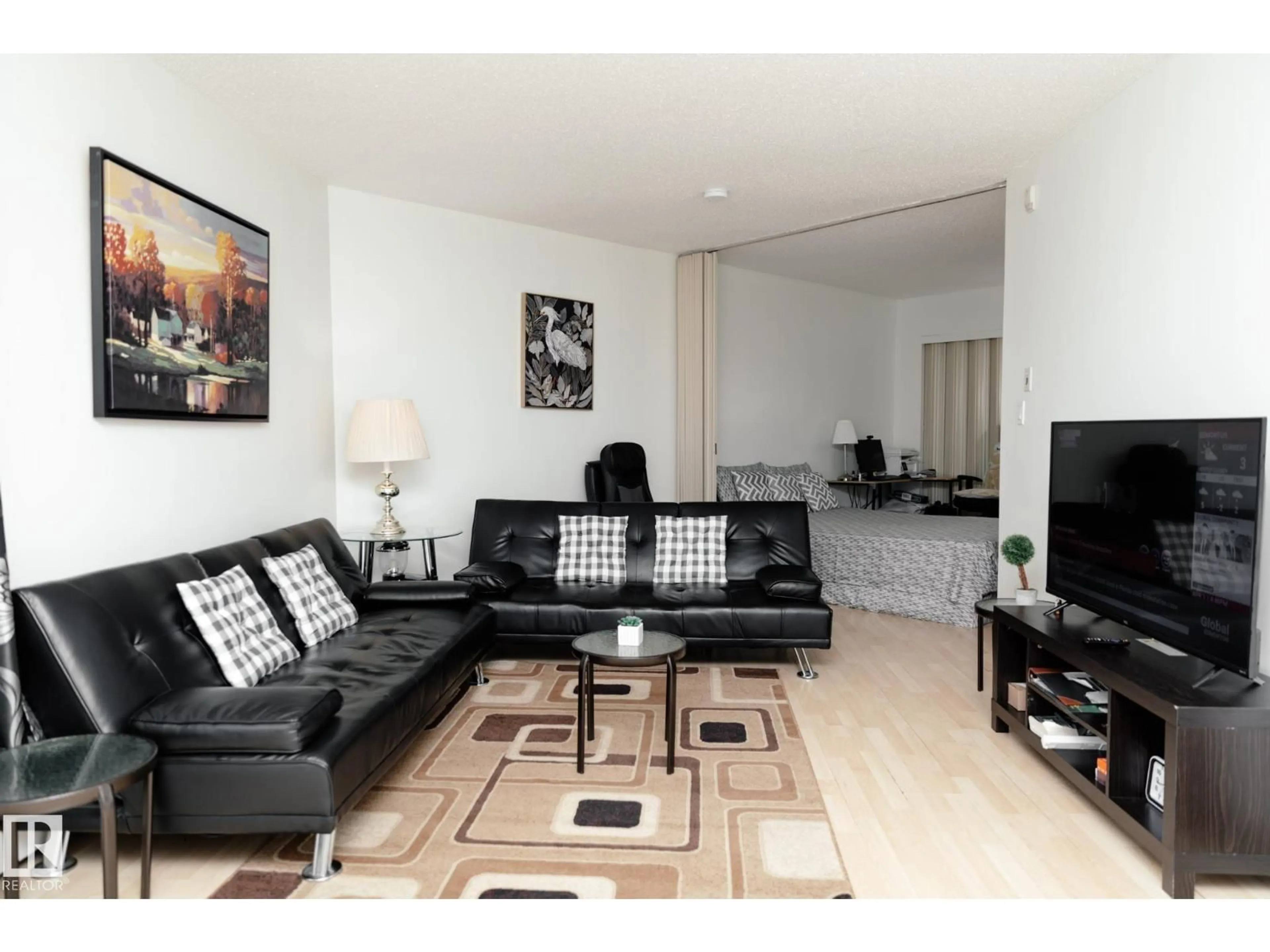 Living room with furniture, wood/laminate floor for 42 - 11245 31 AV, Edmonton Alberta T6J3V5