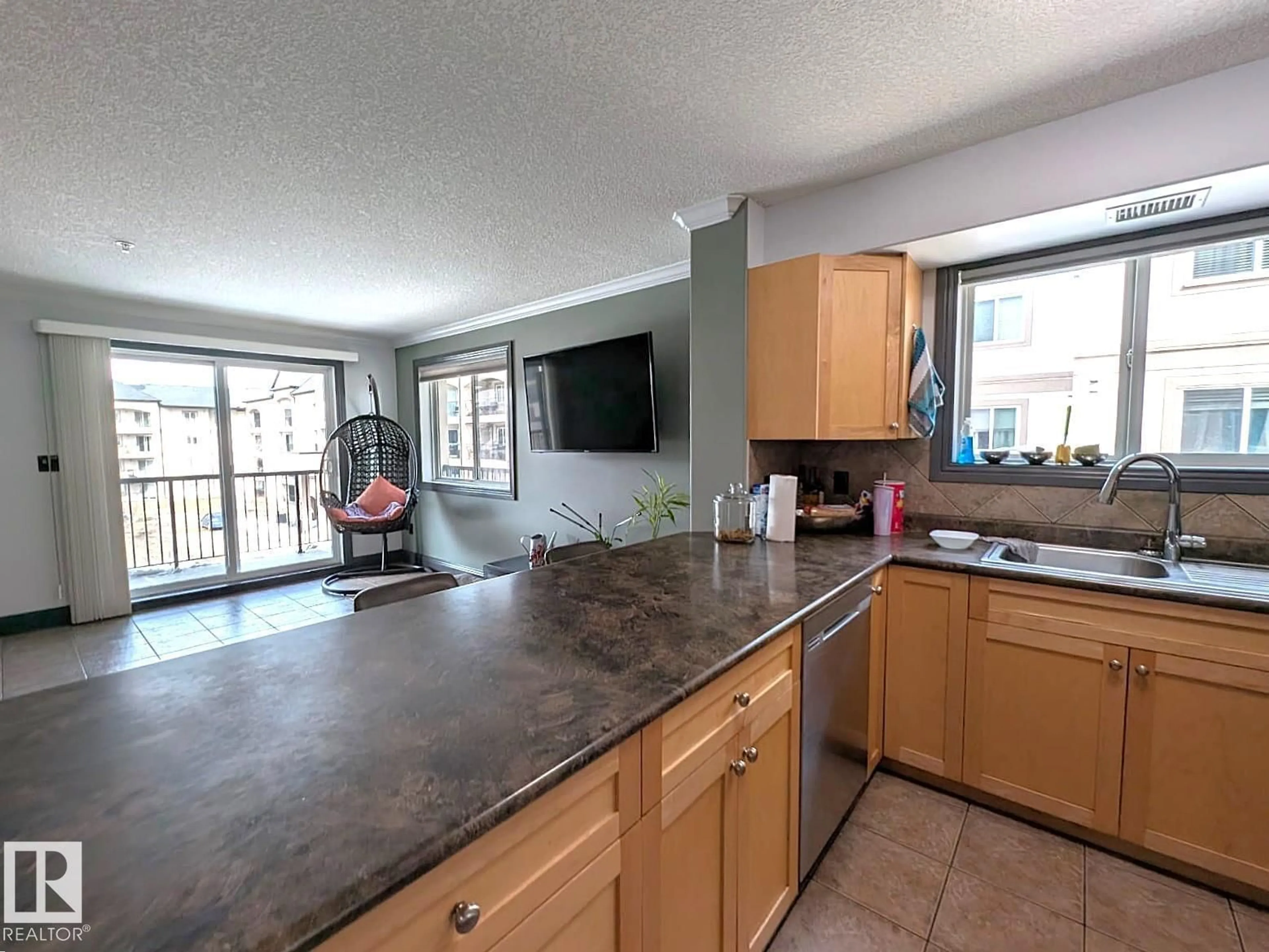 Open concept kitchen, unknown for #324 - 13111 140 AV, Edmonton Alberta T6V0B1