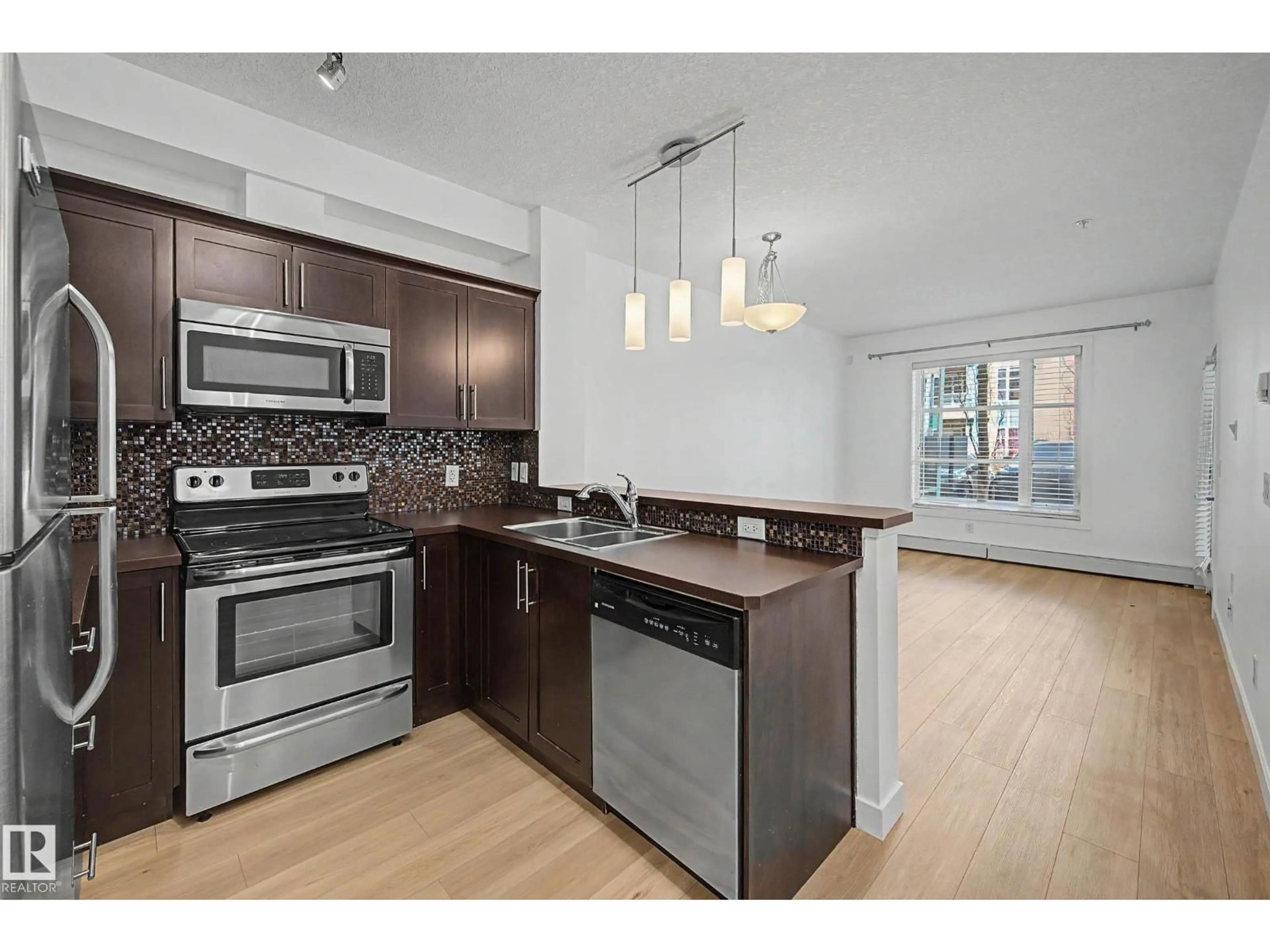 Open concept kitchen, unknown for #123 - 2584 ANDERSON WY, Edmonton Alberta T6W0R2