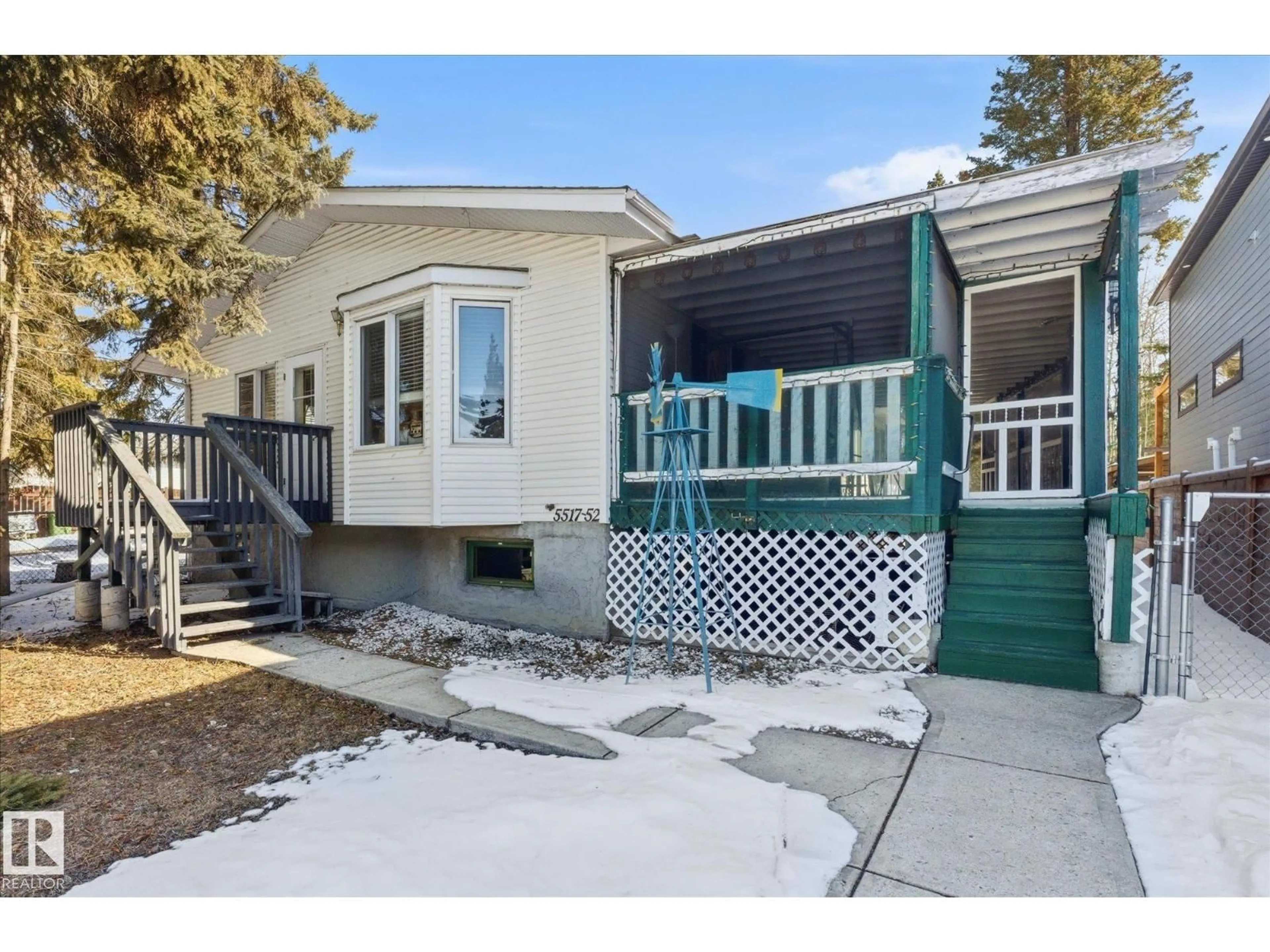 Home with vinyl exterior material, street for 5517 52 ST, Wabamun Alberta T0E2K0