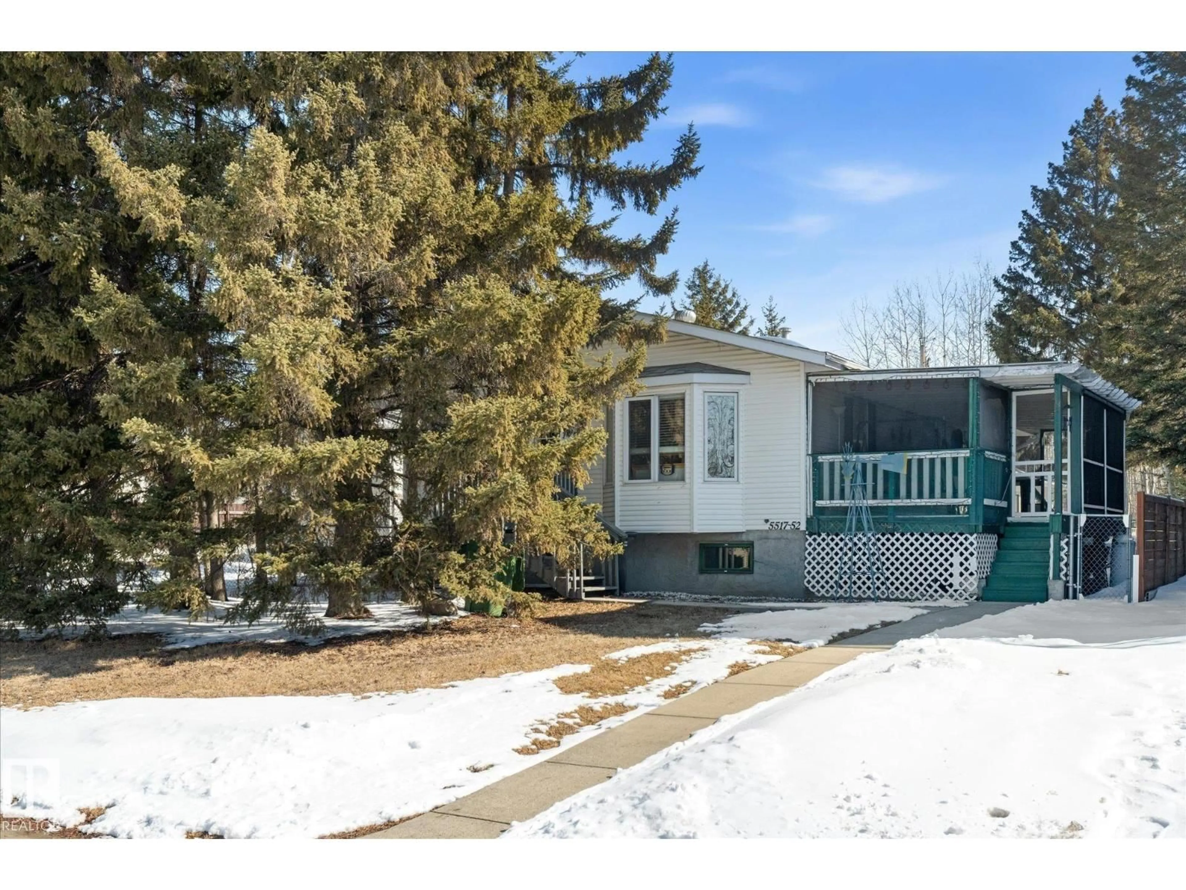 Home with vinyl exterior material, street for 5517 52 ST, Wabamun Alberta T0E2K0