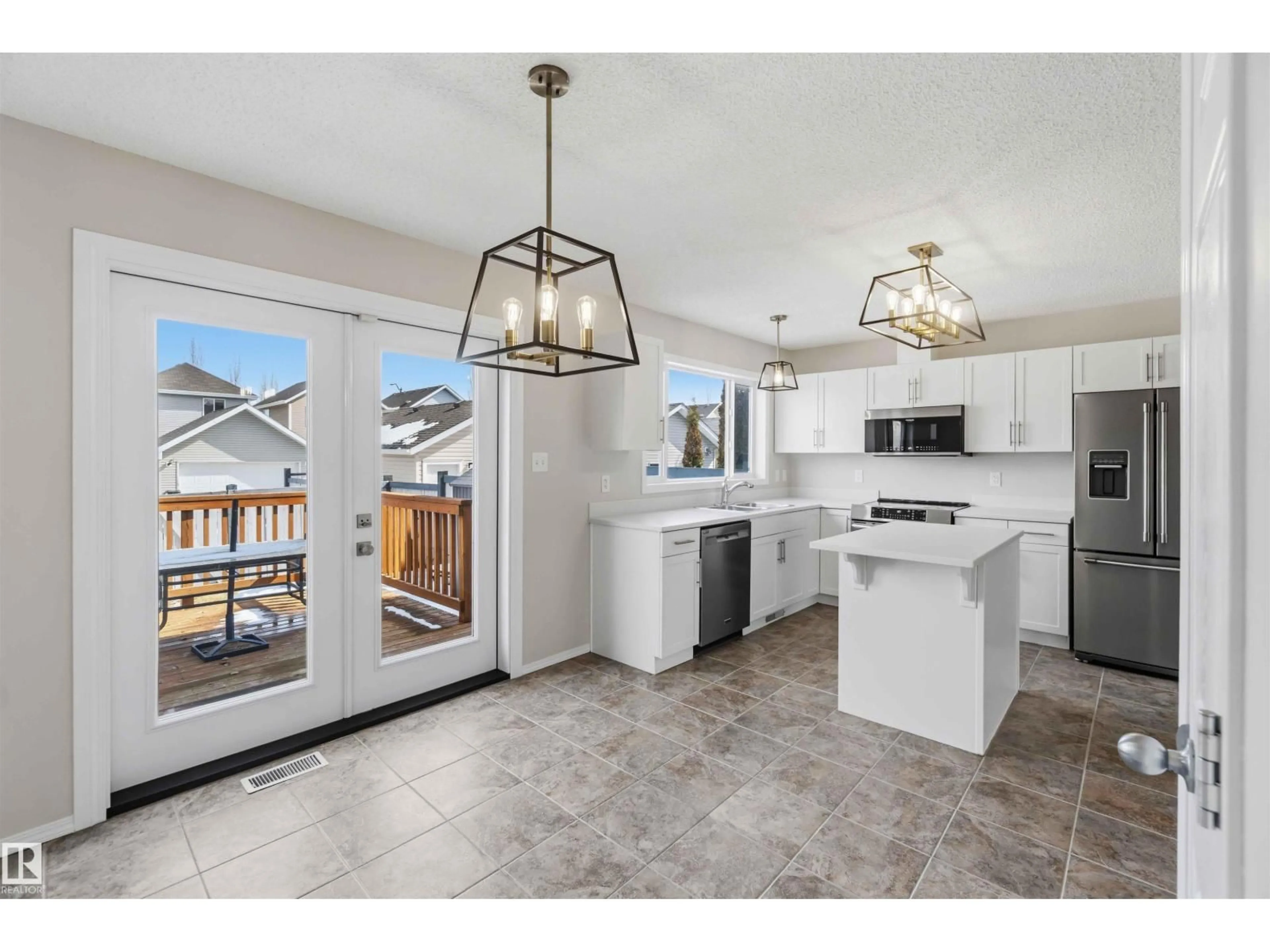 Open concept kitchen, ceramic/tile floor for 2003 71 ST, Edmonton Alberta T6X0K2