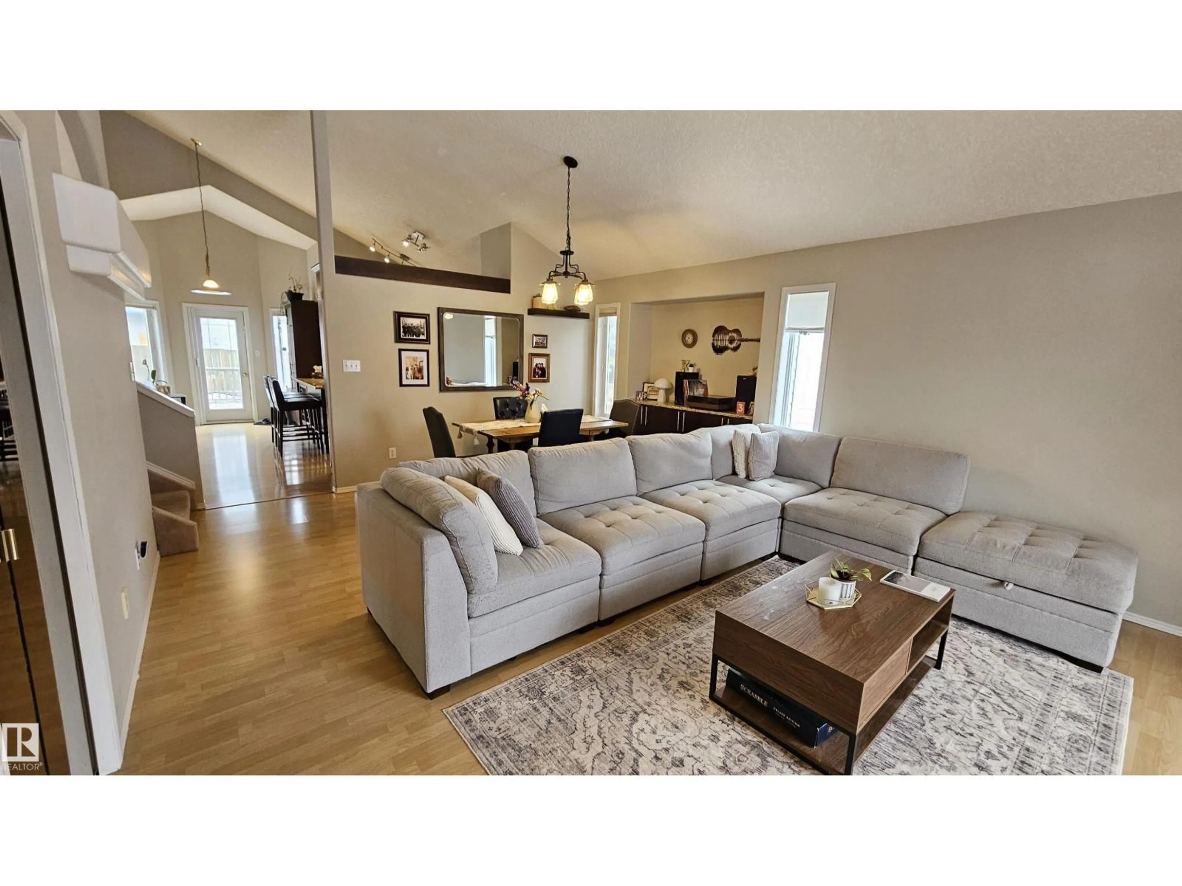 Living room with furniture, wood/laminate floor for 128 CHANCERY PT, Sherwood Park Alberta T8H1Z4