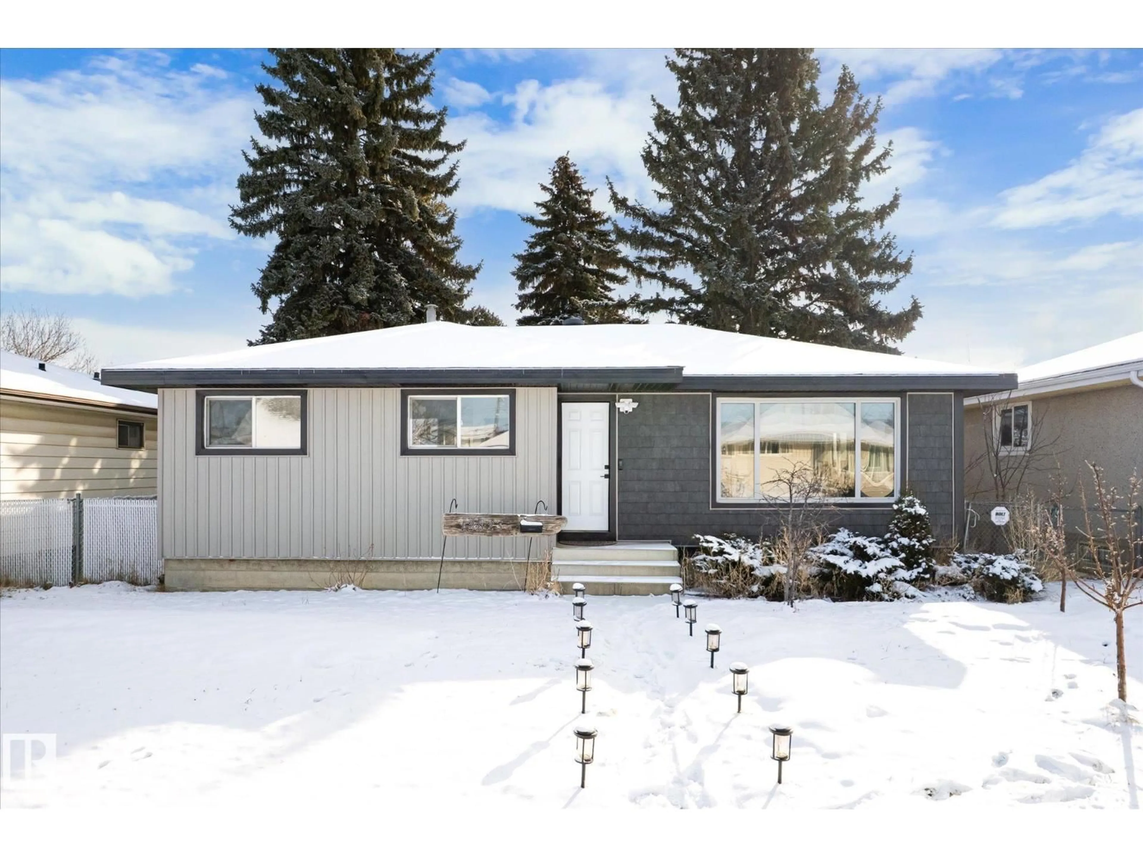 Home with vinyl exterior material, street for NW - 12823 81 ST, Edmonton Alberta T5C1N1