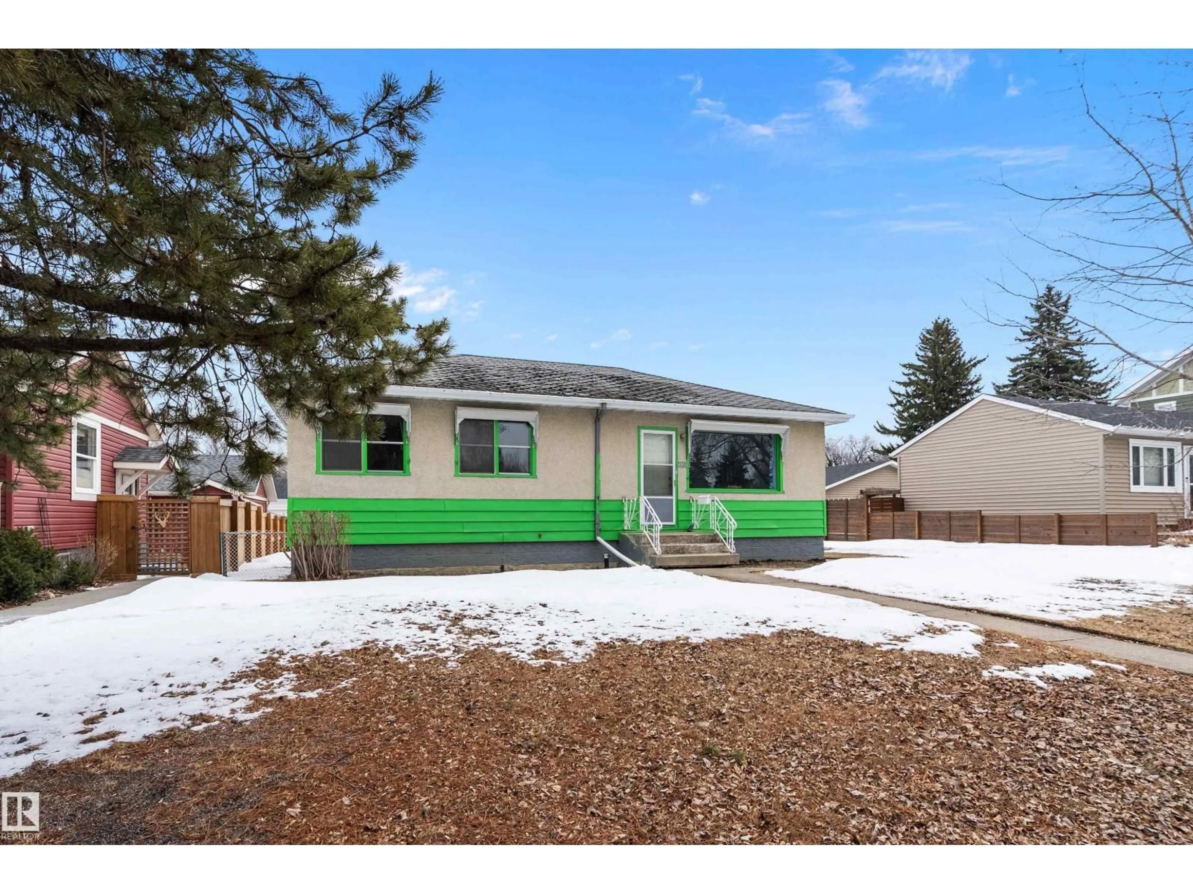 Home with vinyl exterior material, street for 7720 85 AV, Edmonton Alberta T6C1G1