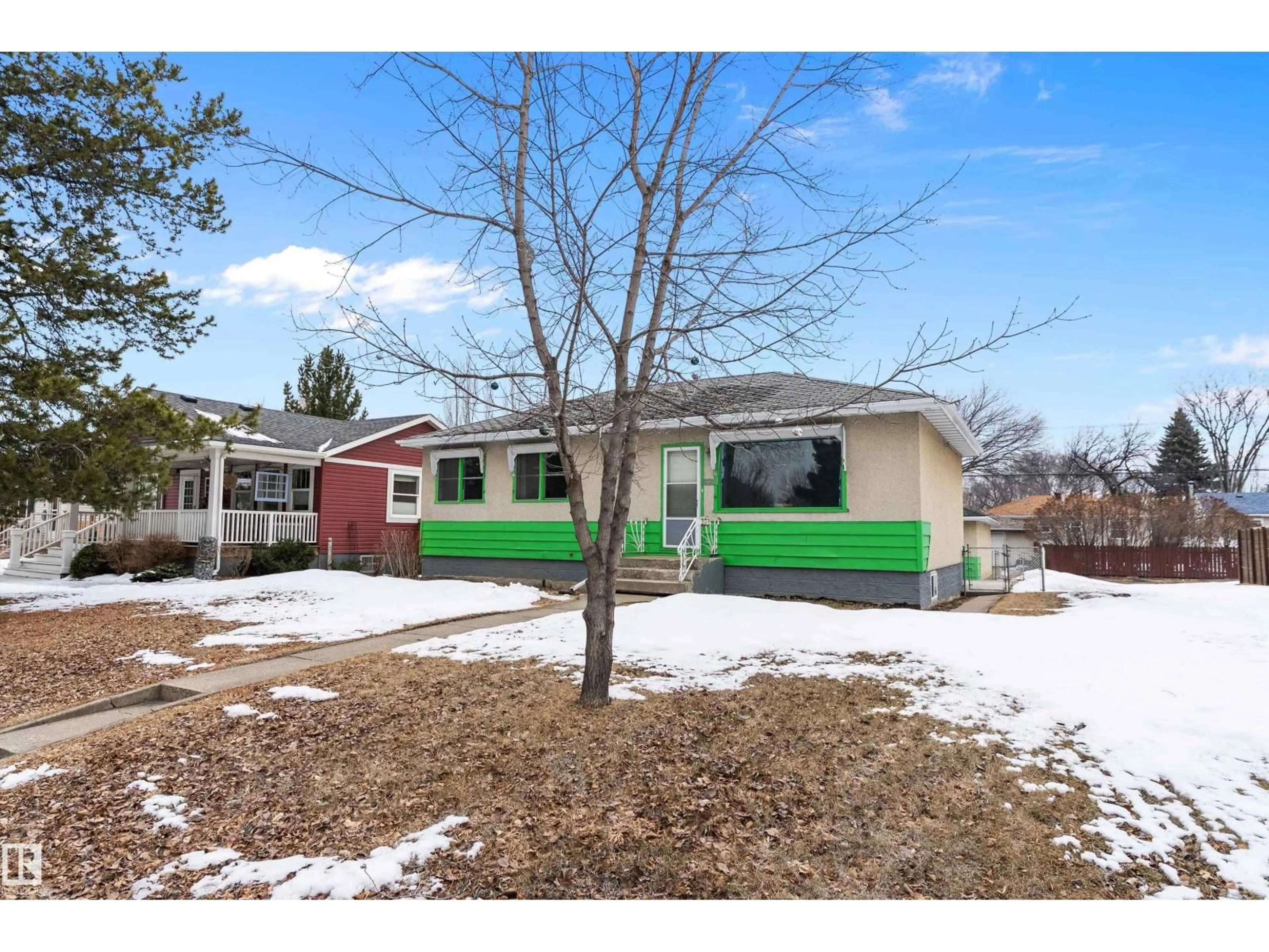 Home with vinyl exterior material, street for 7720 85 AV, Edmonton Alberta T6C1G1