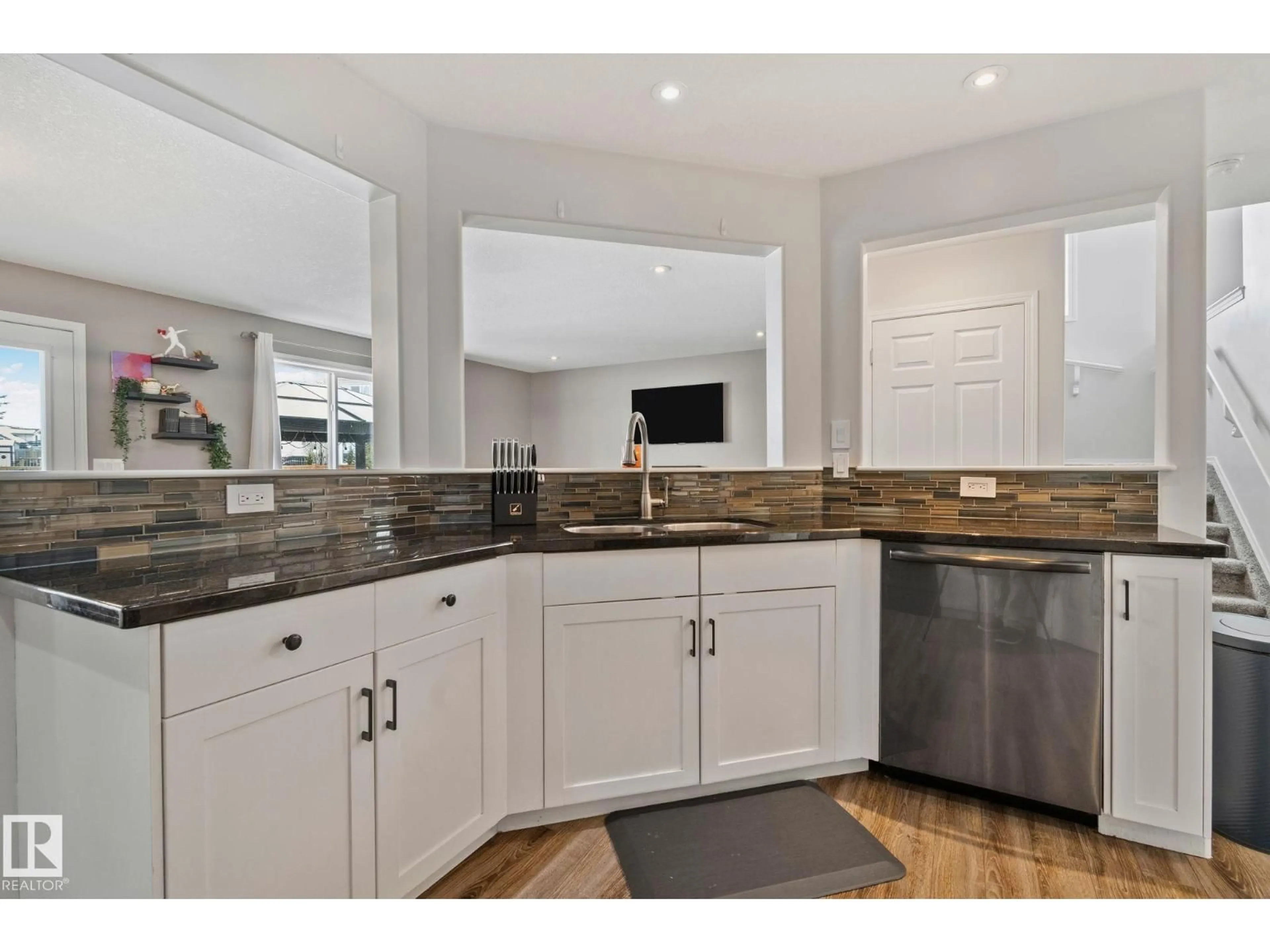 Open concept kitchen, ceramic/tile floor for 3711 161 AV, Edmonton Alberta T5Y3G2