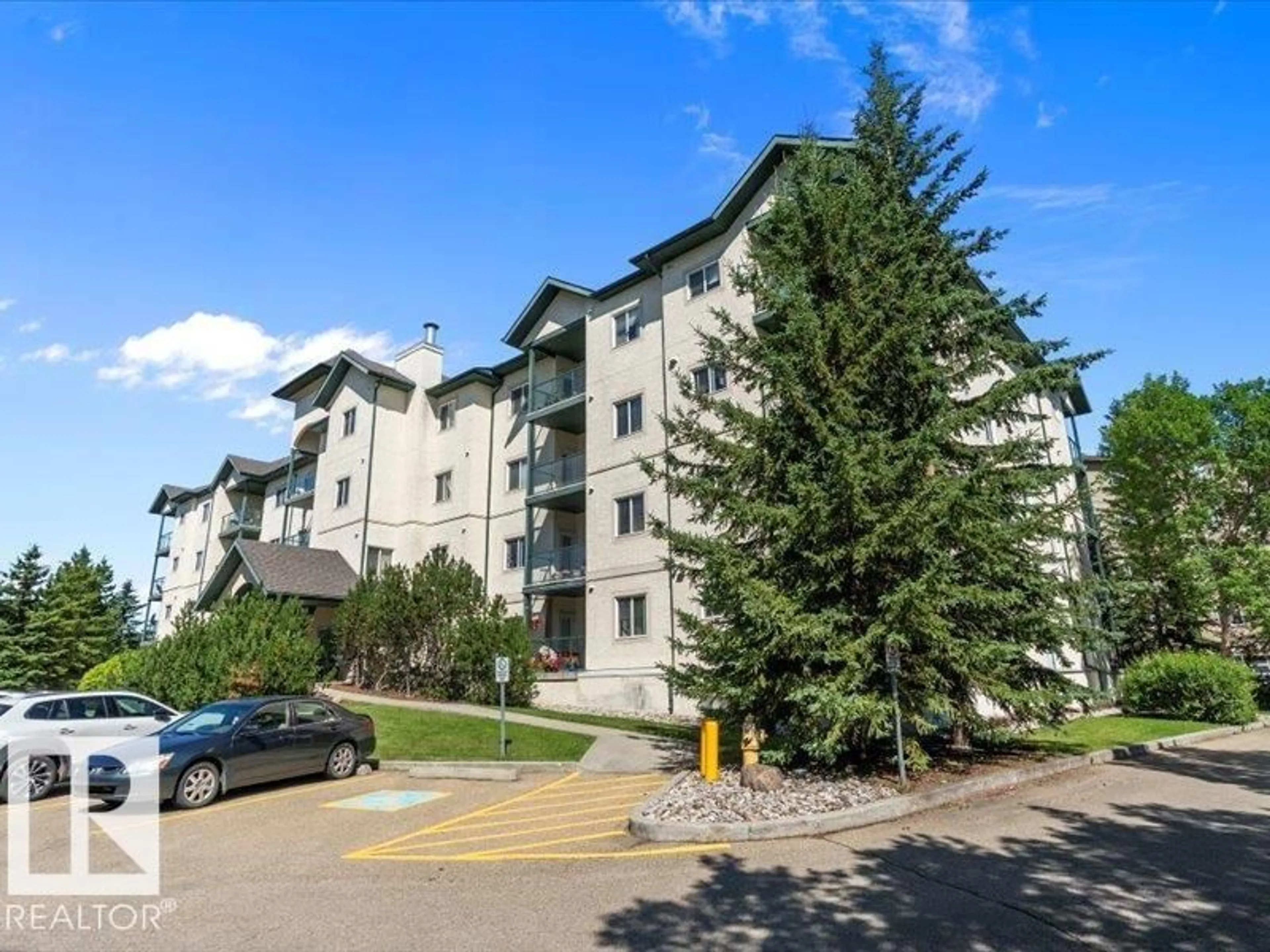 A pic from outside/outdoor area/front of a property/back of a property/a pic from drone, mountain view for 304 - 408 LEWIS ESTATES BV, Edmonton Alberta T5T6Y7