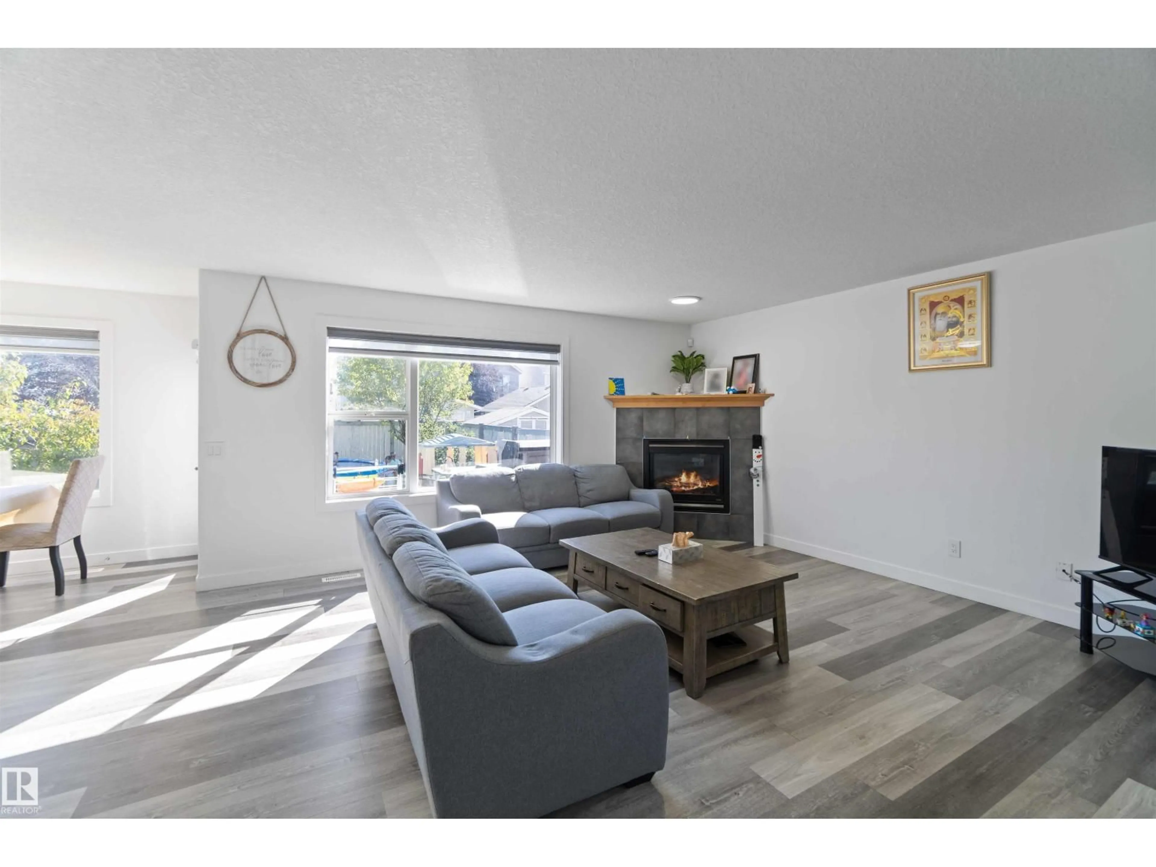 Living room with furniture, unknown for SW - 1017 82 ST, Edmonton Alberta T6X1E4