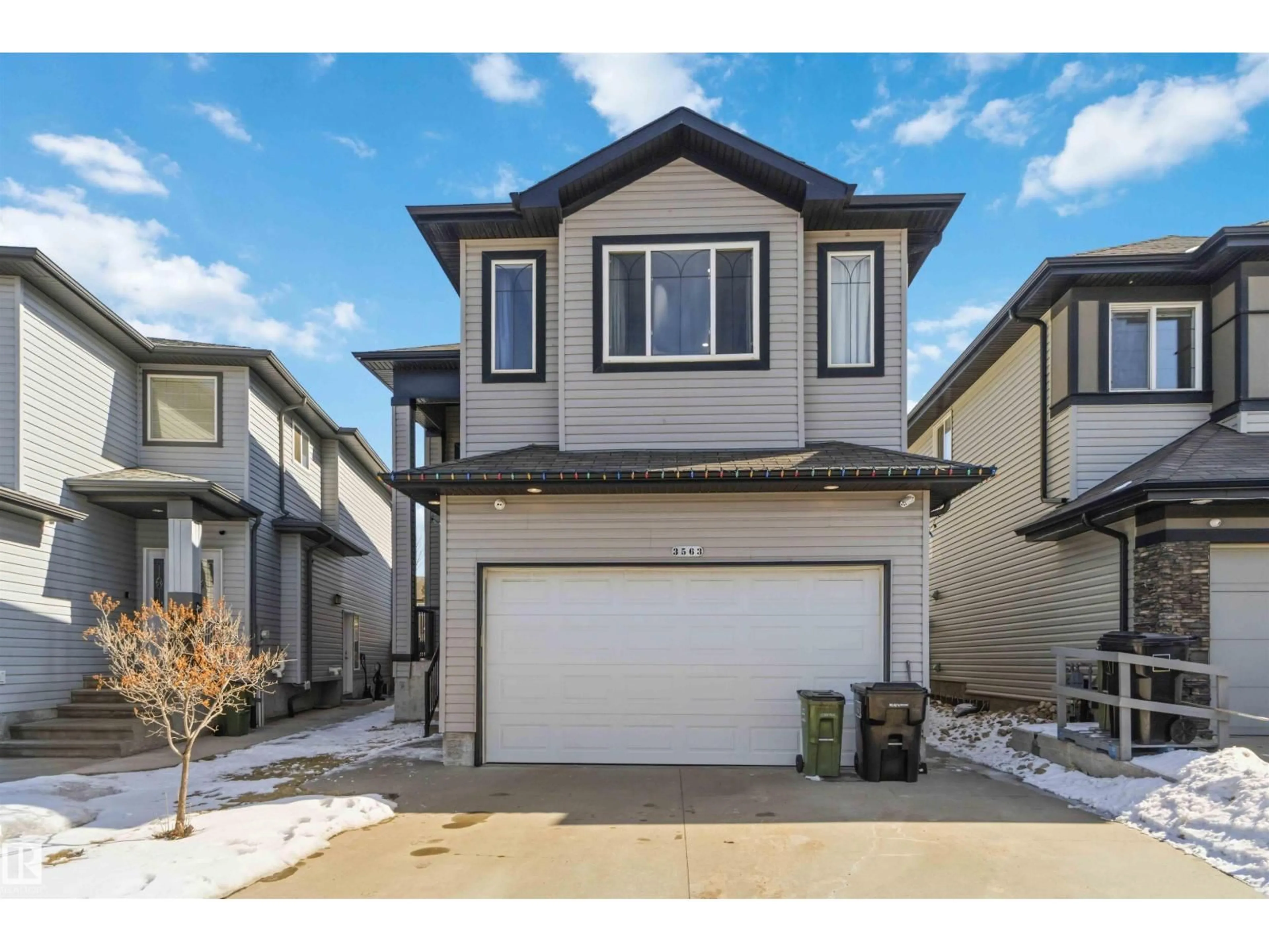 Home with vinyl exterior material, street for 3563 14 ST, Edmonton Alberta T6T0J3