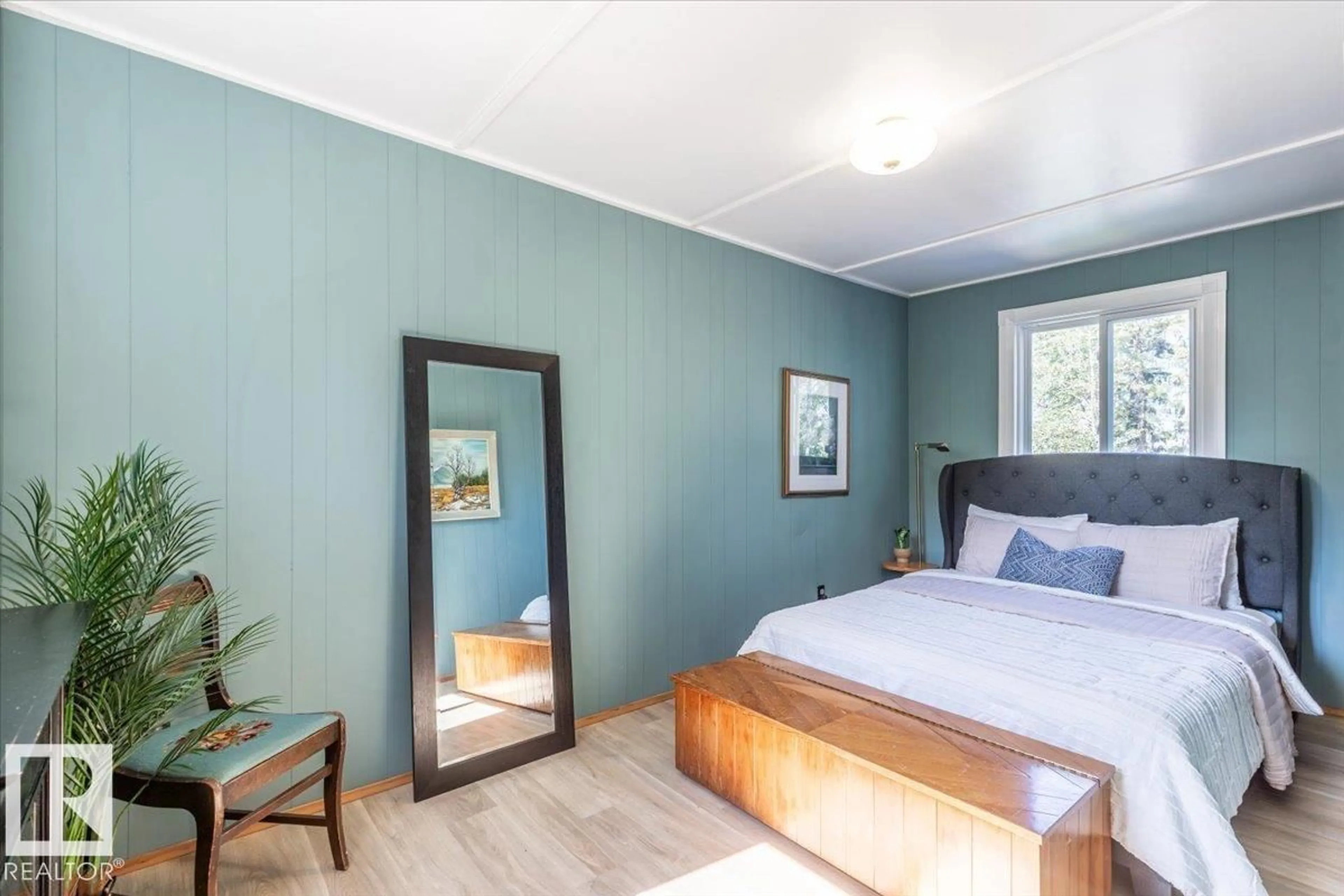 Bedroom with bed, wood/laminate floor for 101 1ST AVE, Rural Wetaskiwin County Alberta T0C1X0