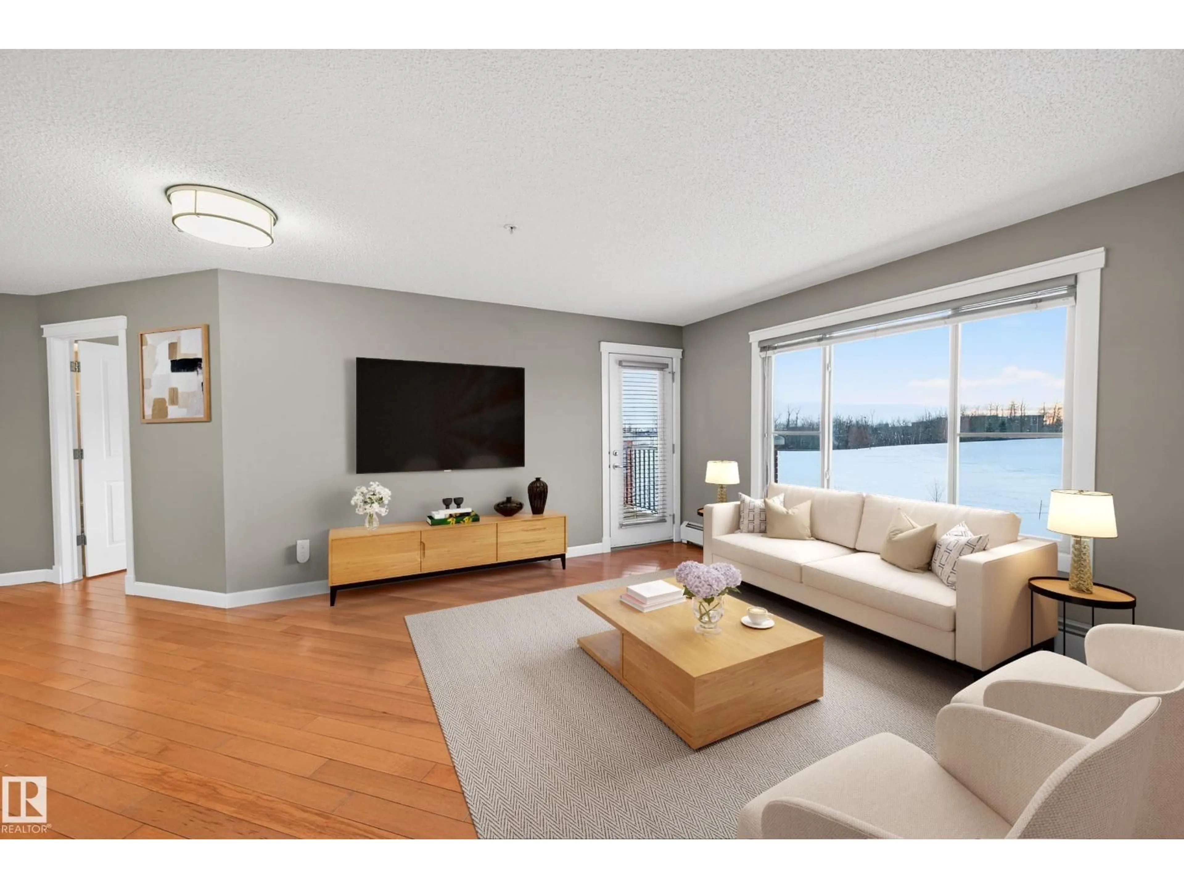 Living room with furniture, wood/laminate floor for #311 - 3719 WHITELAW LN, Edmonton Alberta T6W2C3