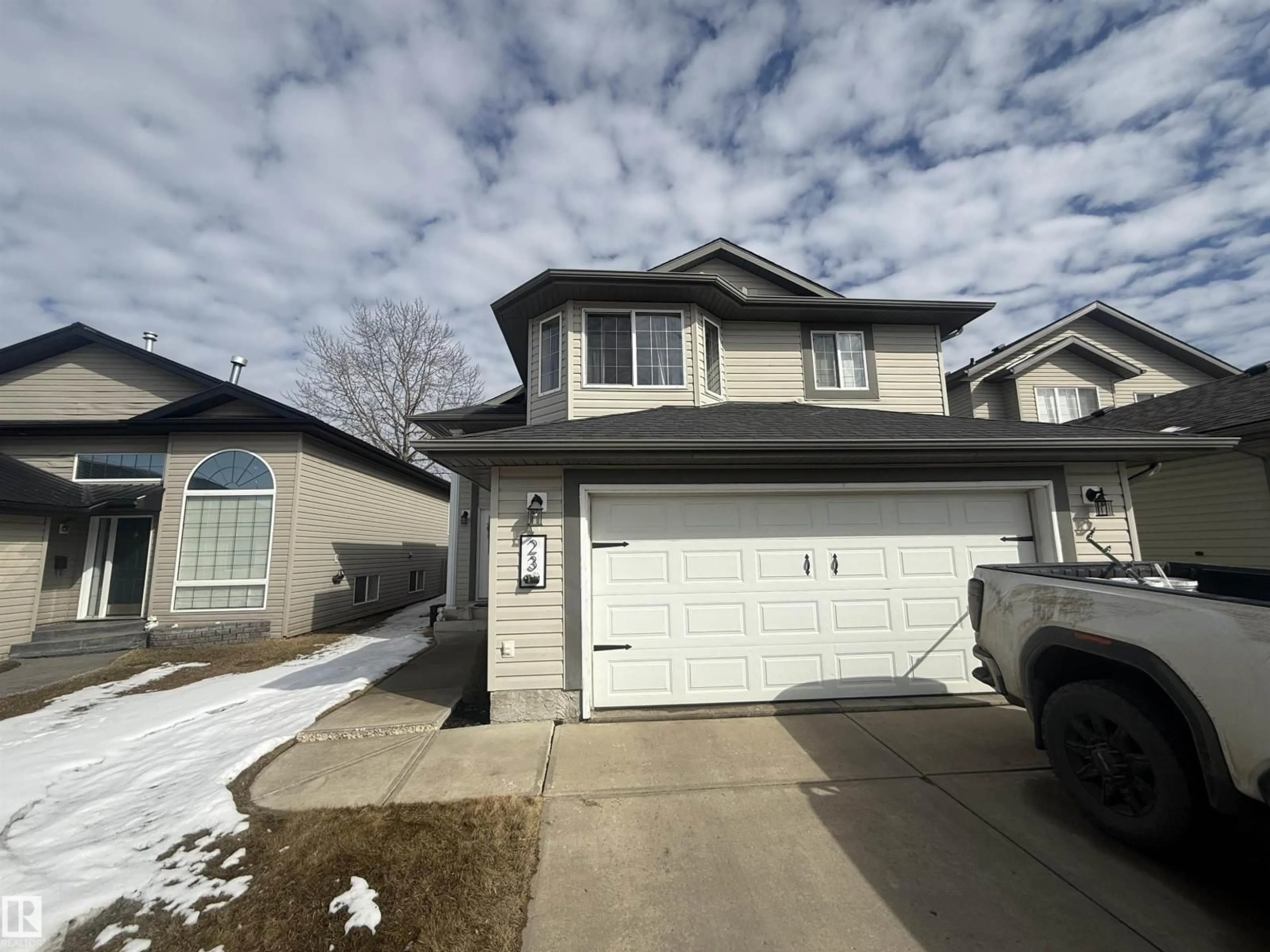 Home with vinyl exterior material, street for 23 GRAYRIDGE BA, Stony Plain Alberta T7Z2P9