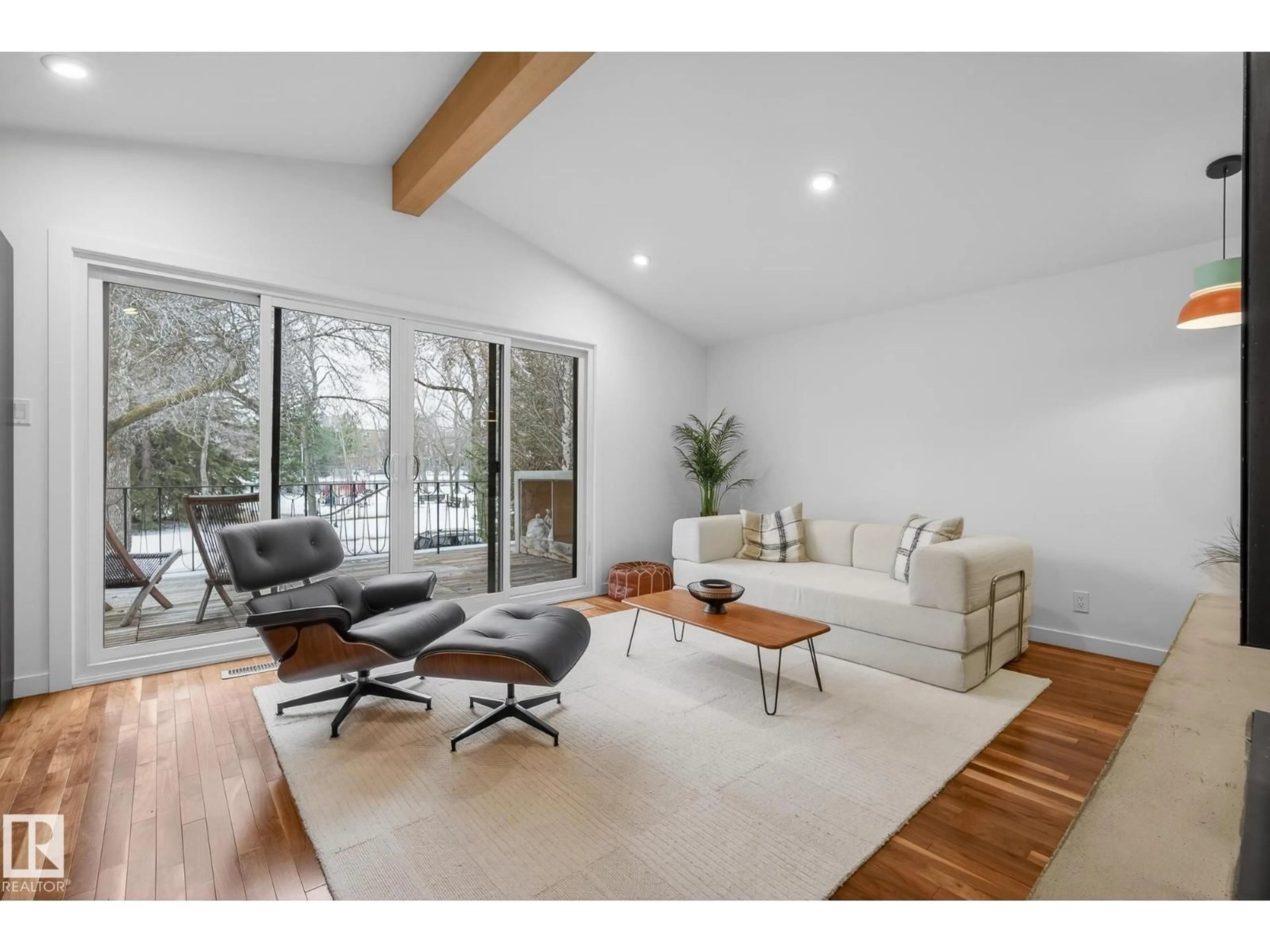 Living room with furniture, wood/laminate floor for 9736 78 AVENUE AVENUE, Edmonton Alberta T6E1N2