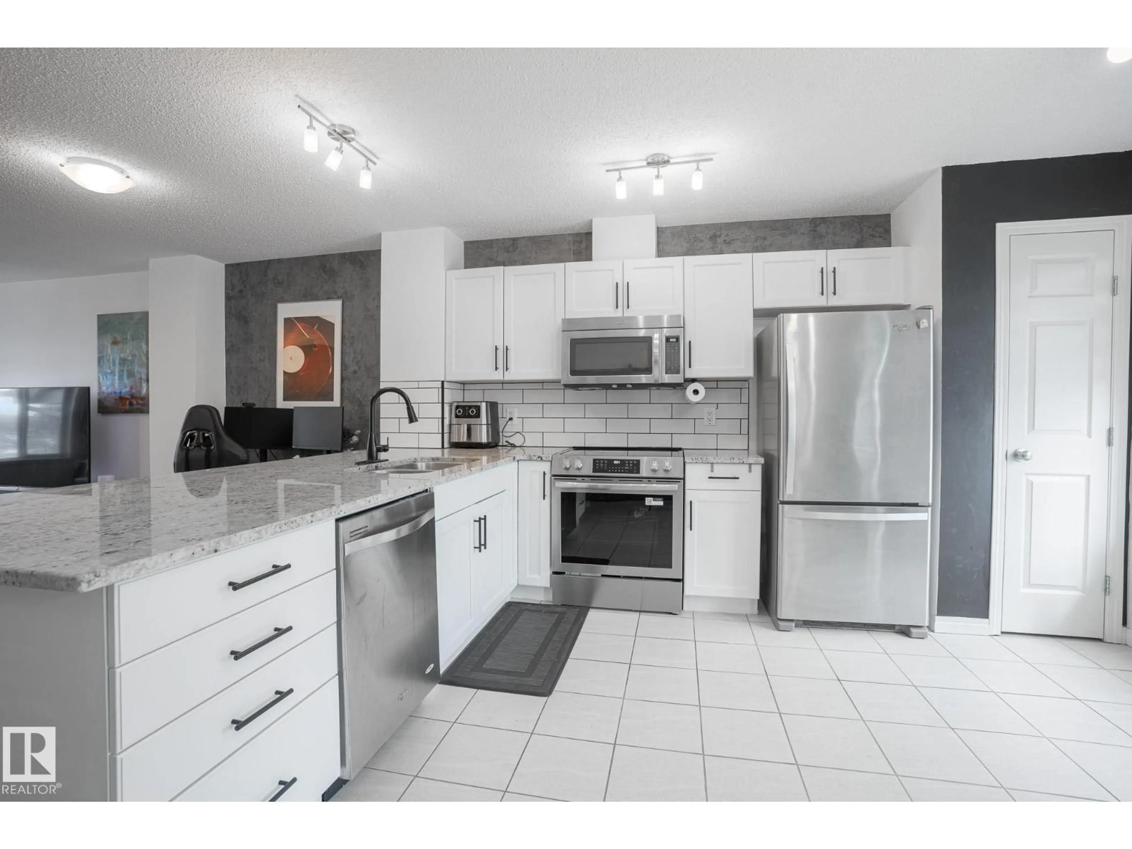Open concept kitchen, ceramic/tile floor for #13 - 2905 141 ST, Edmonton Alberta T6W1S4