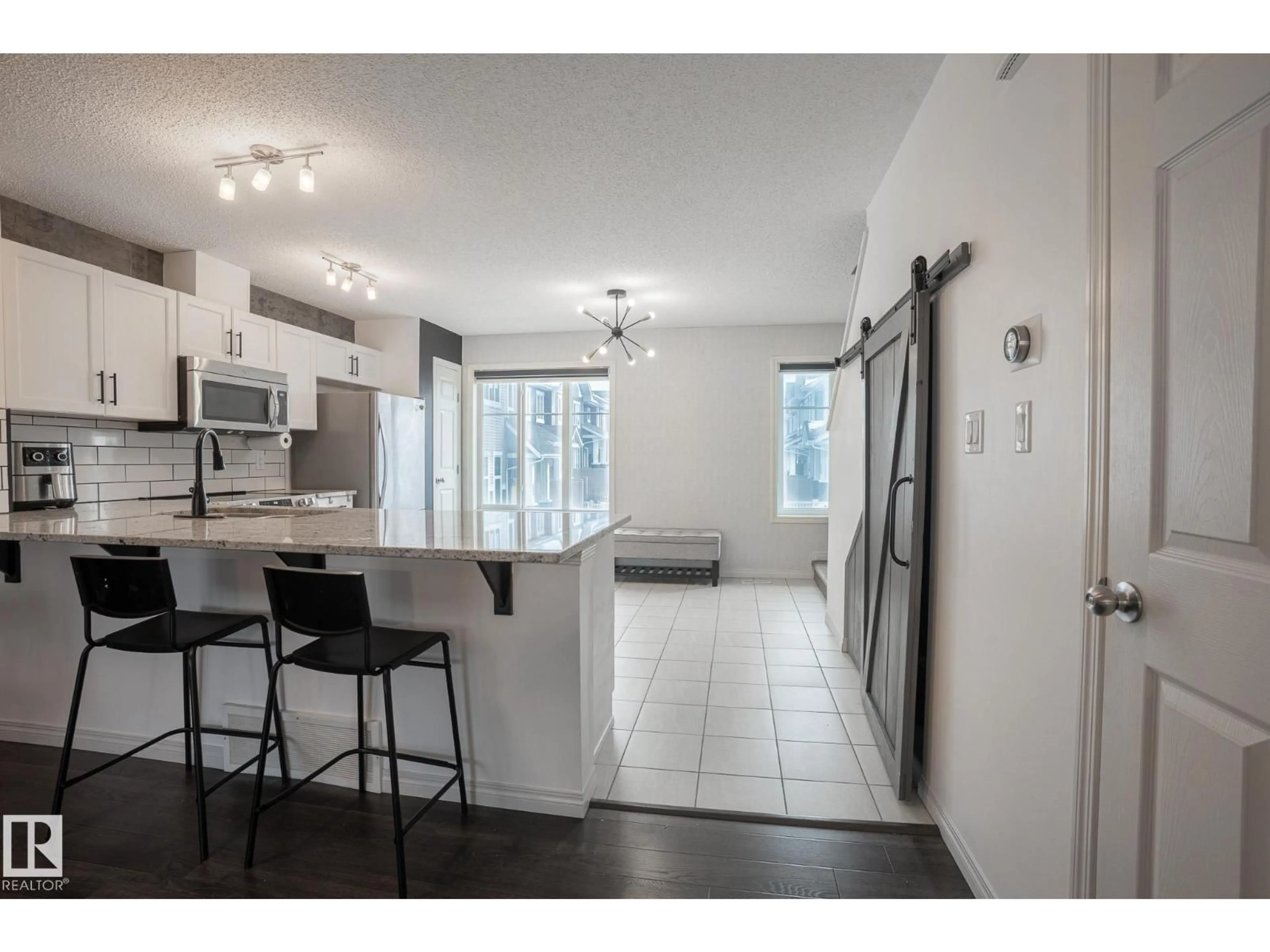 Open concept kitchen, unknown for #13 - 2905 141 ST, Edmonton Alberta T6W1S4