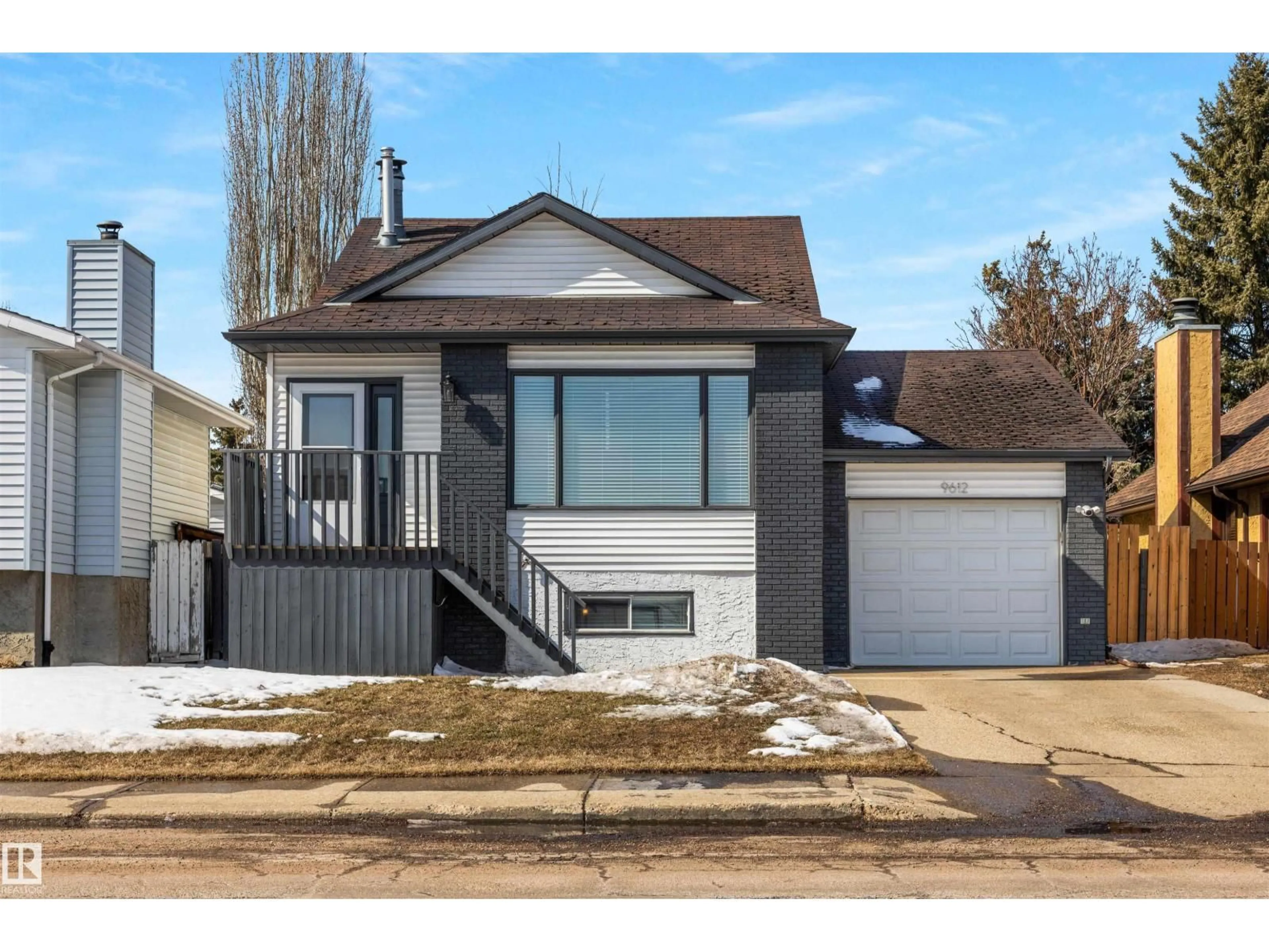 Home with vinyl exterior material, street for NW - 9612 189 ST, Edmonton Alberta T5T5L2