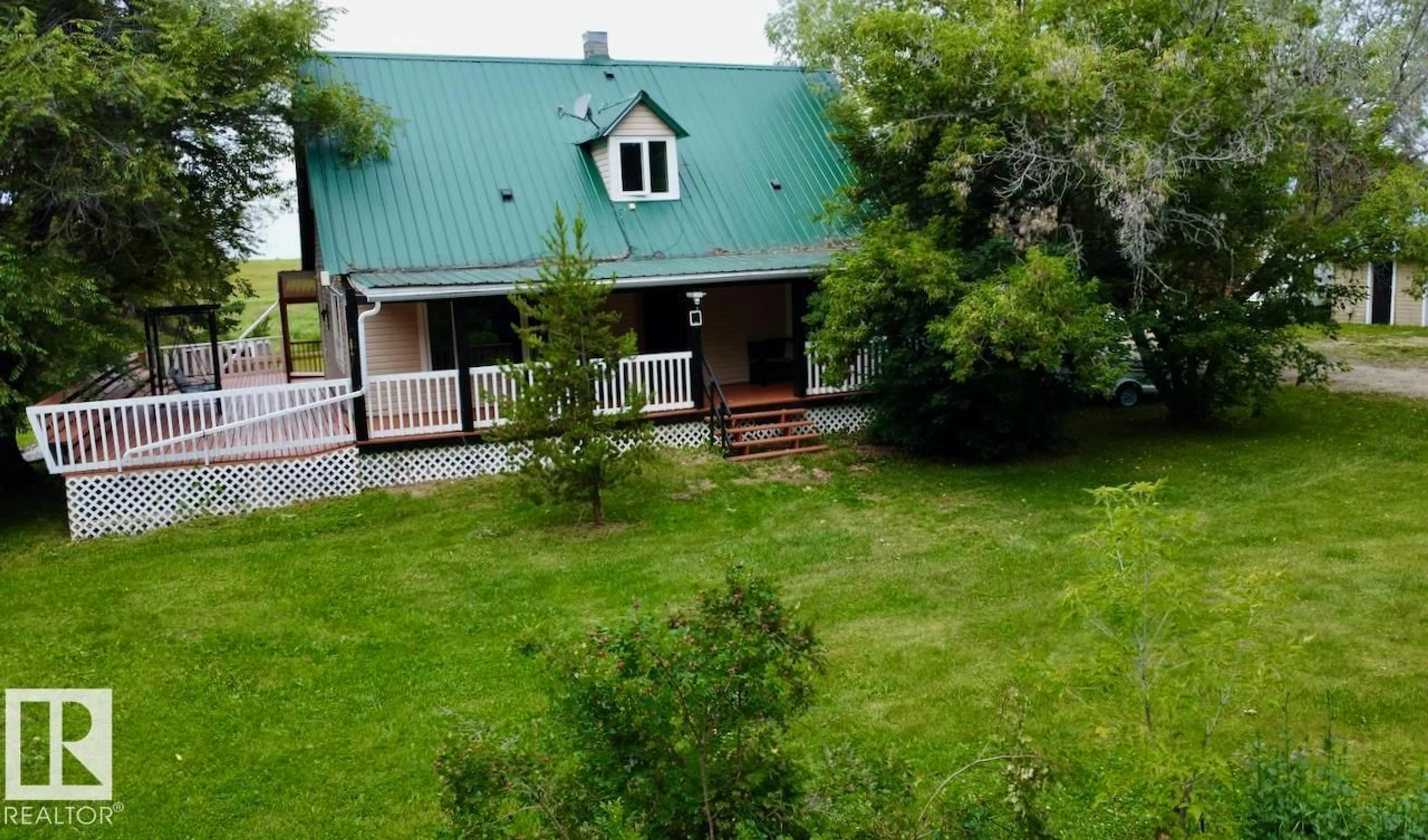 A pic from outside/outdoor area/front of a property/back of a property/a pic from drone, mountain view for 53320 RGE ROAD 55, Rural Parkland County Alberta T0E0V0