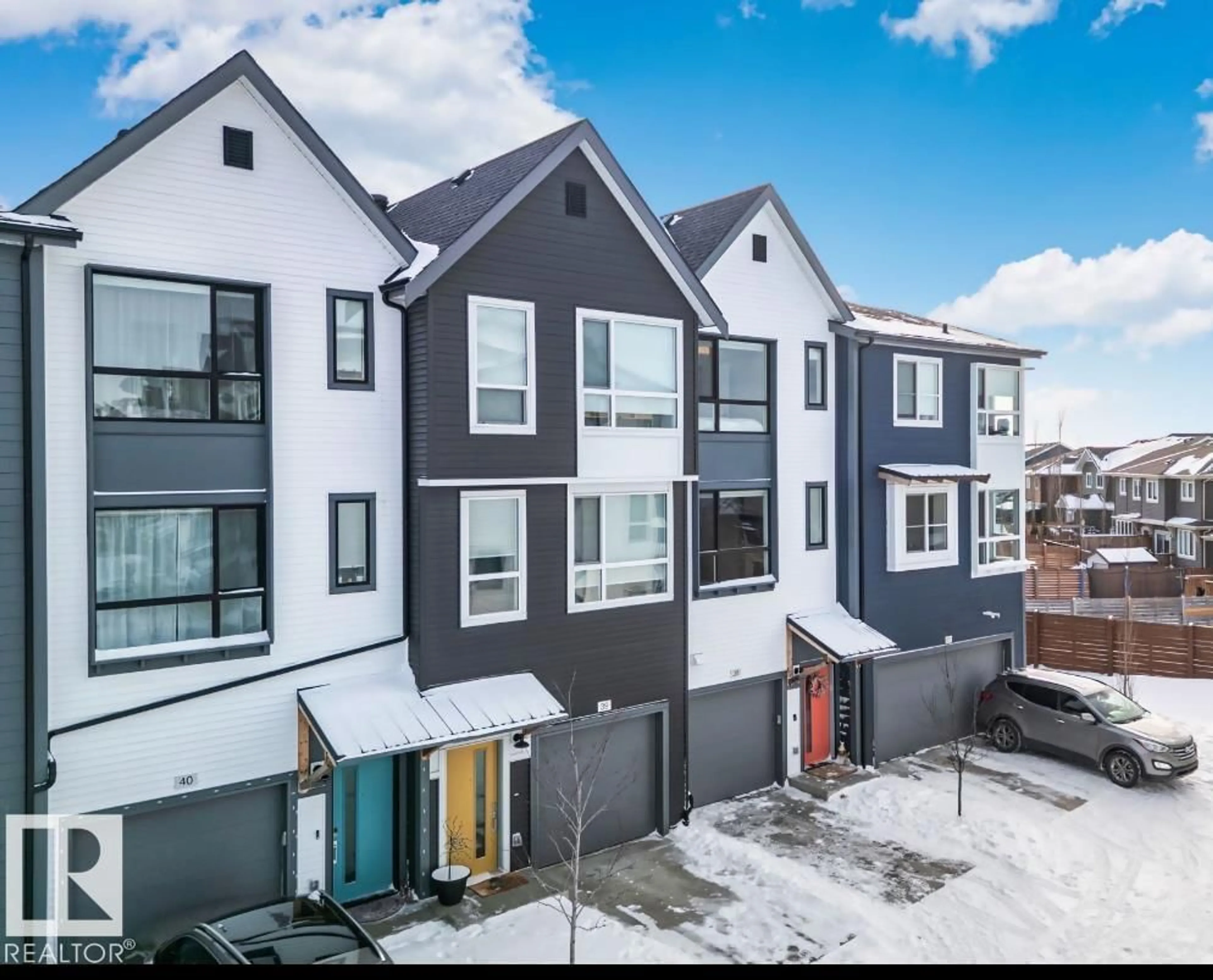 A pic from outside/outdoor area/front of a property/back of a property/a pic from drone, unknown for 100 - 38 JENSEN LAKES BLVD., St. Albert Alberta T8N7T9