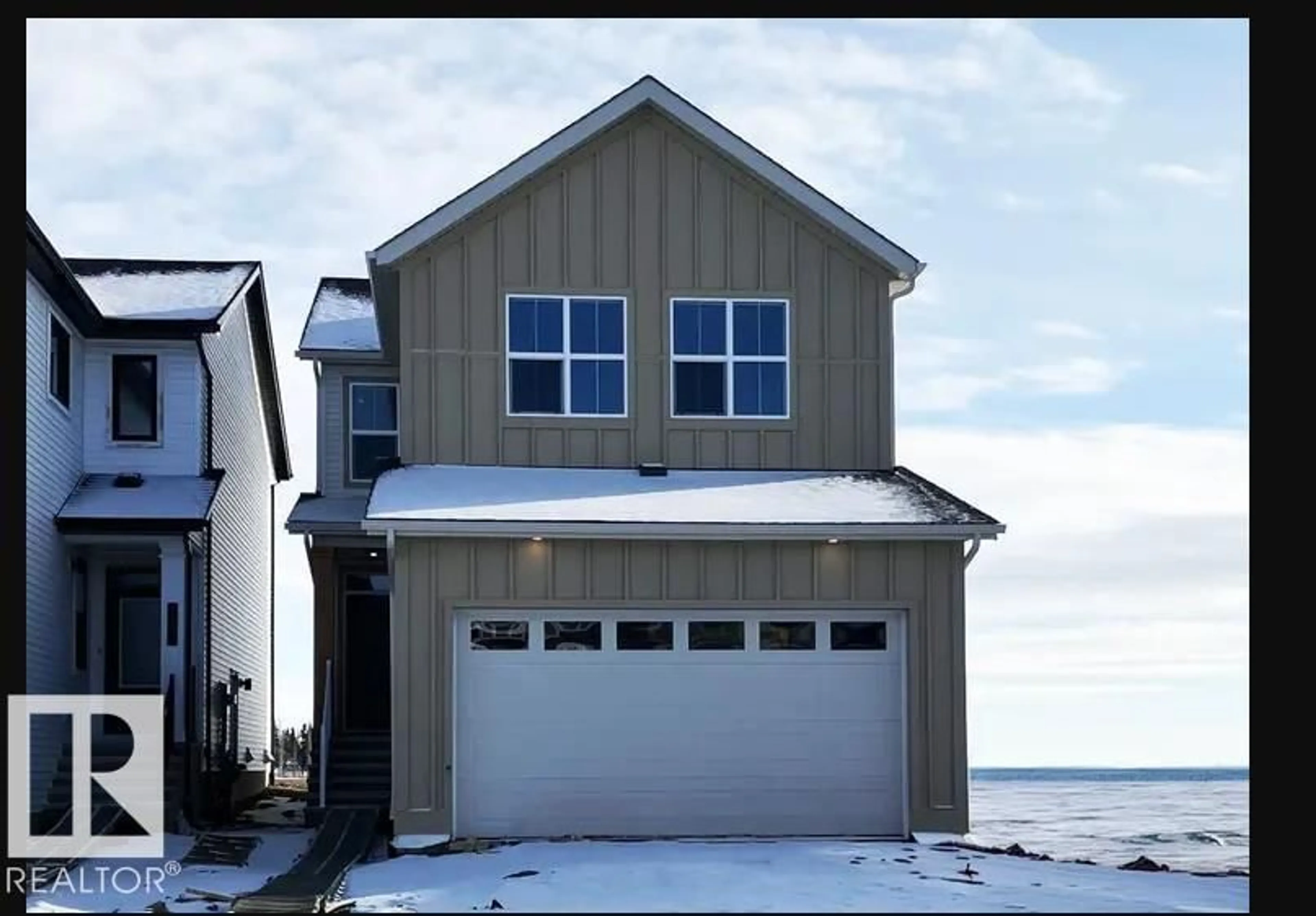 Home with vinyl exterior material, water/lake/river/ocean view for 7103 50A AV, Beaumont Alberta T4X3E5