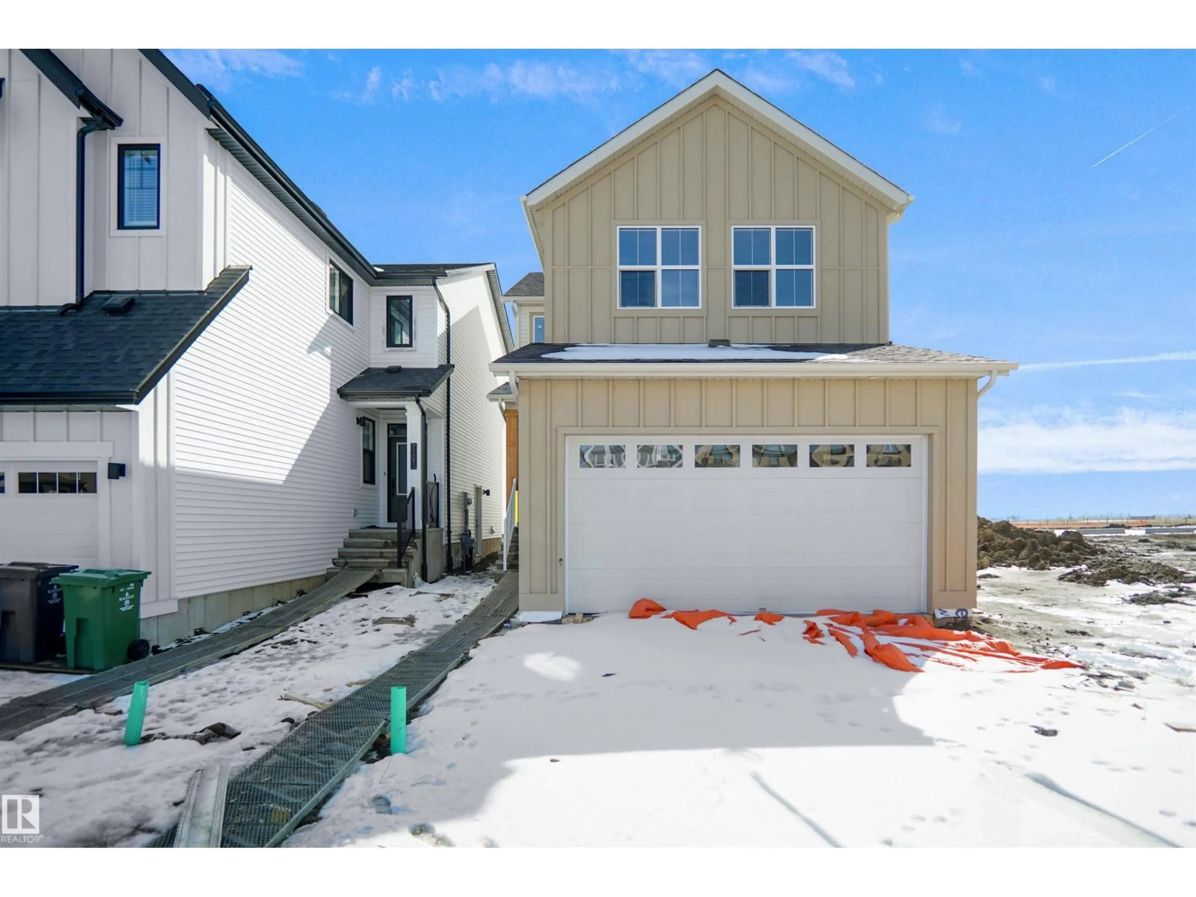 Home with vinyl exterior material, street for 7103 50A AV, Beaumont Alberta T4X3E5