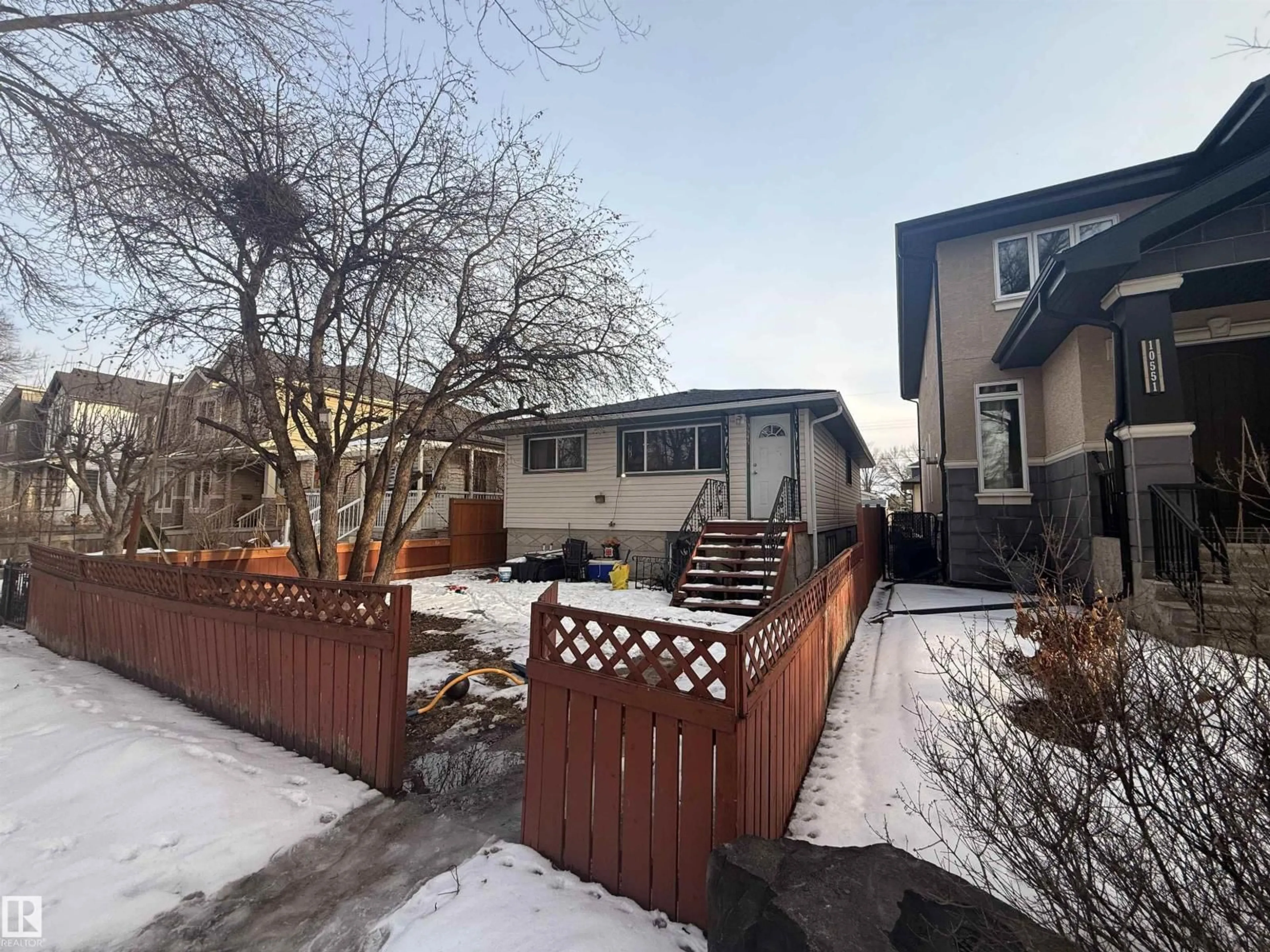 A pic from outside/outdoor area/front of a property/back of a property/a pic from drone, street for 10545 67 AV, Edmonton Alberta T6H1Z4