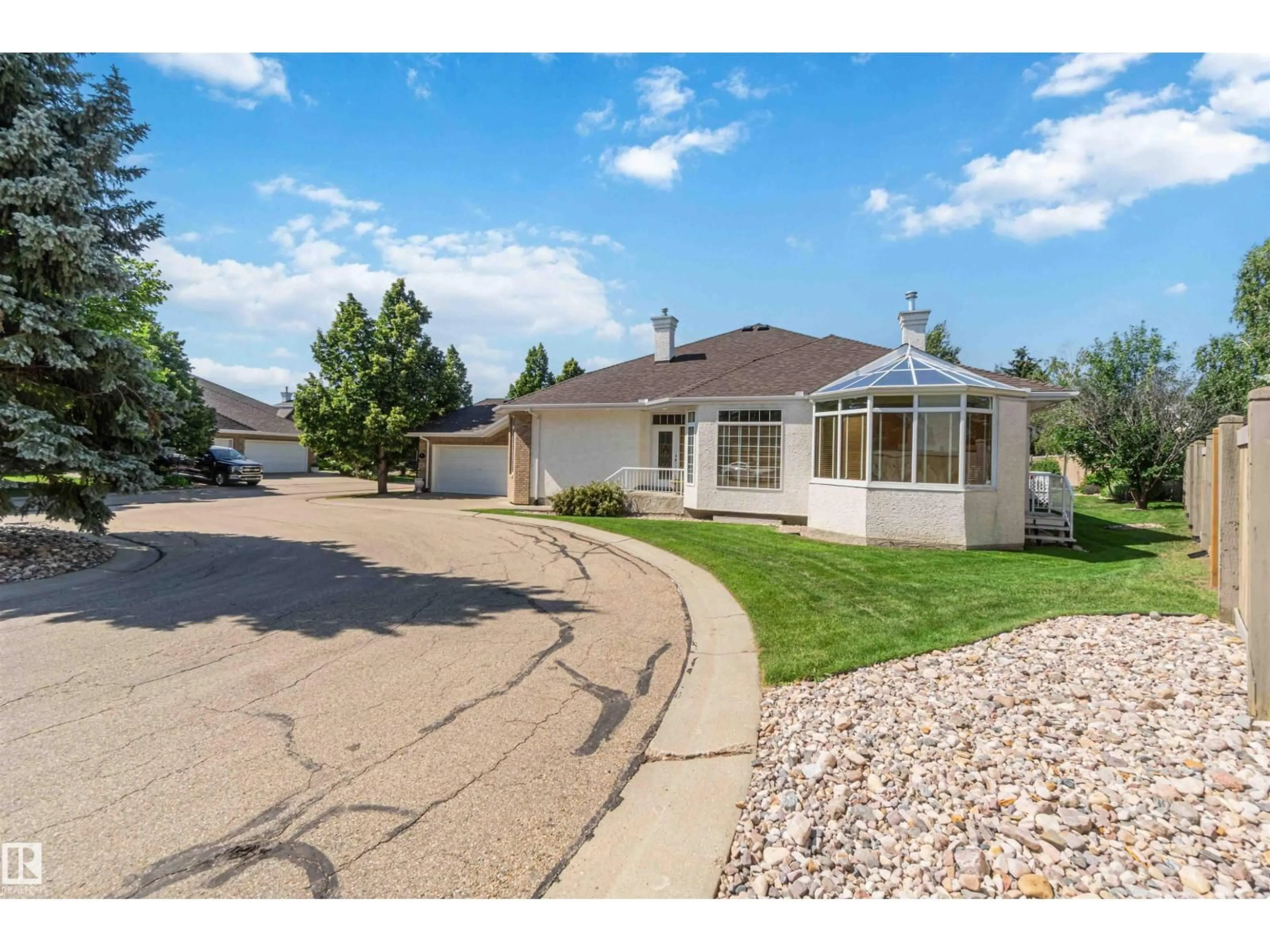 Home with vinyl exterior material, street for 8 BUTTERWORTH PT, Edmonton Alberta T6R2S3