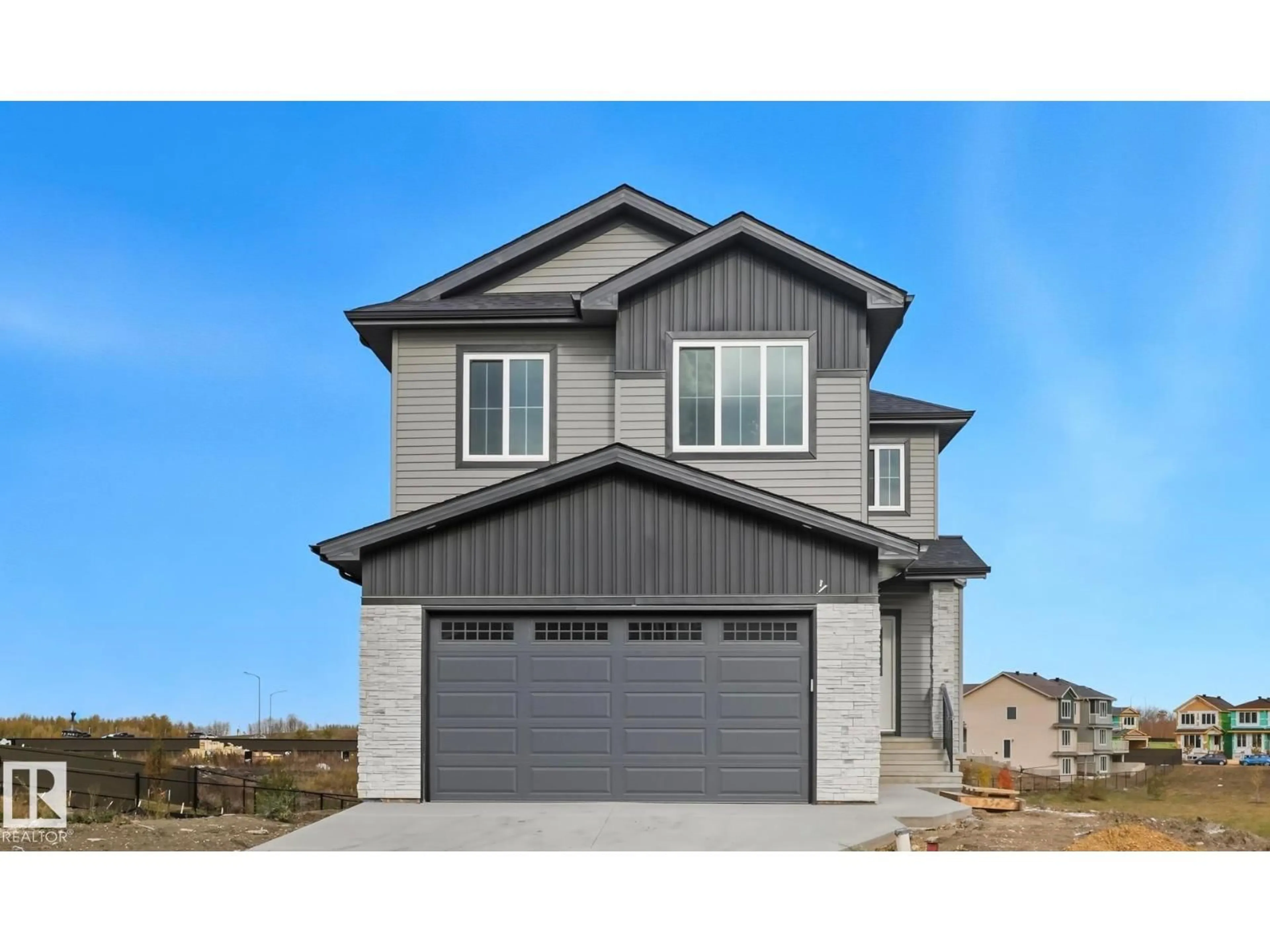 Home with vinyl exterior material, street for NW - 18135 87 ST, Edmonton Alberta T5Z0X3