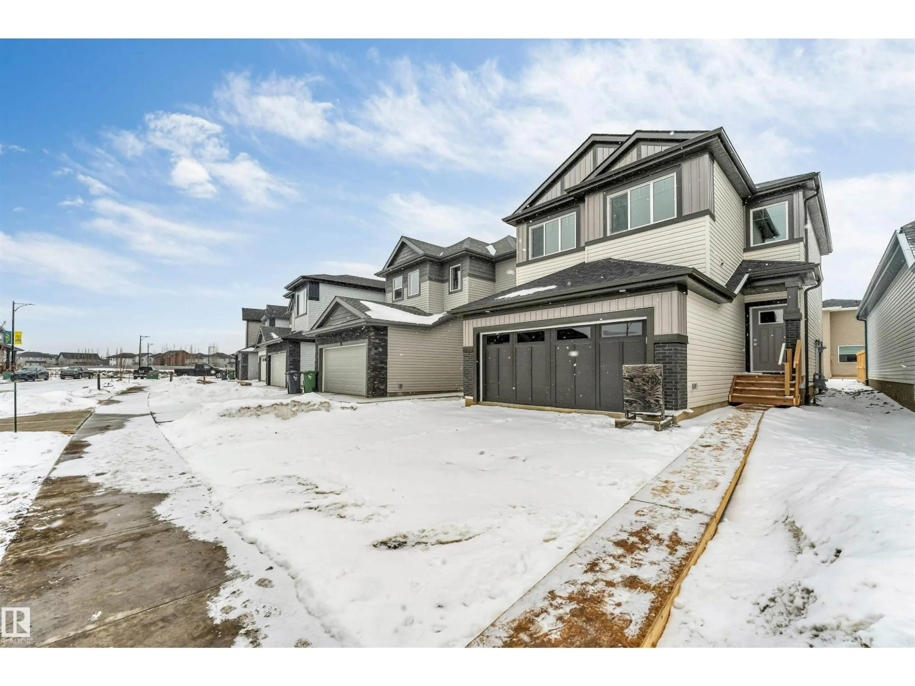 A pic from outside/outdoor area/front of a property/back of a property/a pic from drone, street for 97 DANSEREAU WAY, Beaumont Alberta T6X3E2