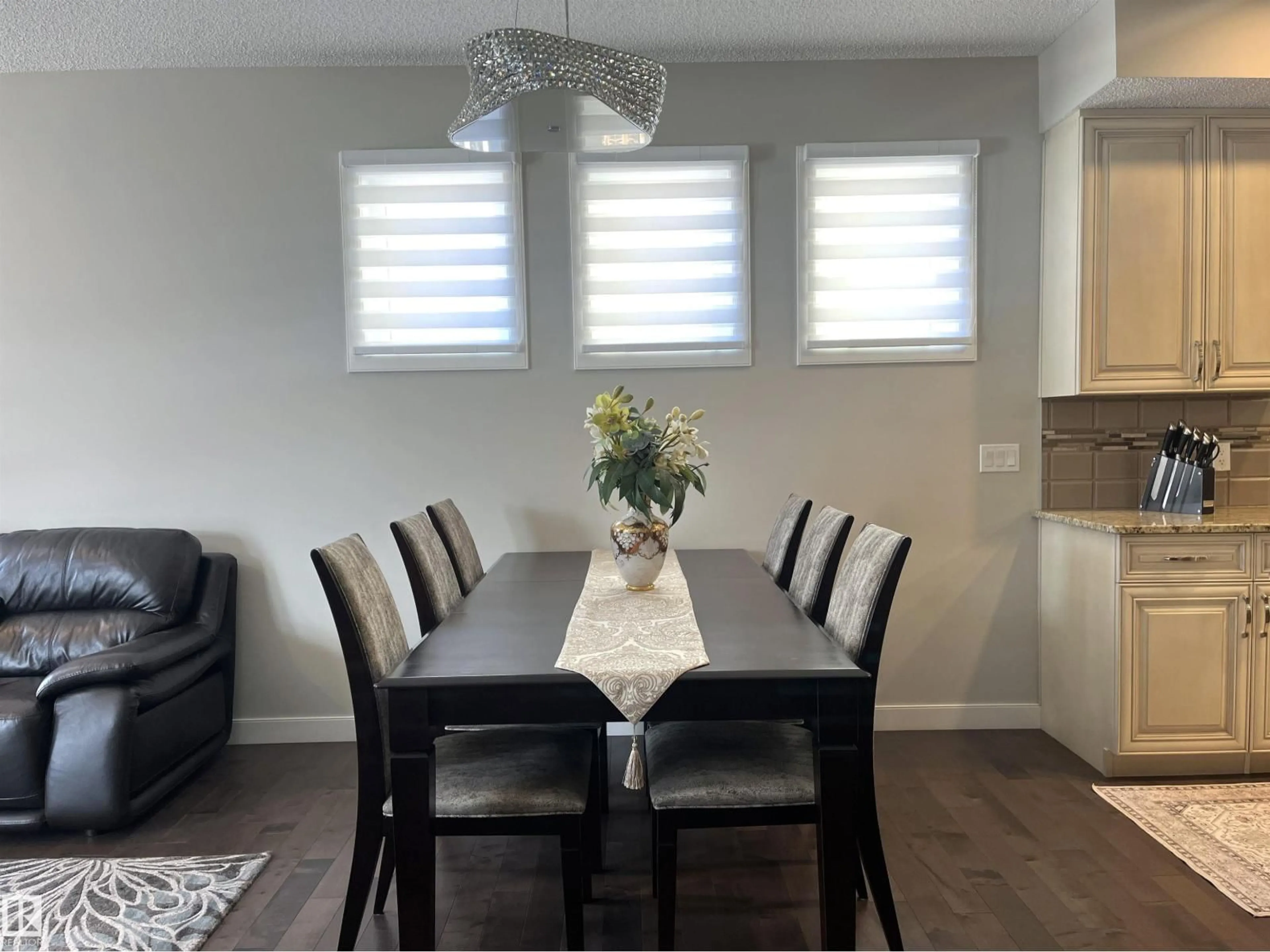 Dining room, wood/laminate floor for 8504 216 ST, Edmonton Alberta T5T4W2