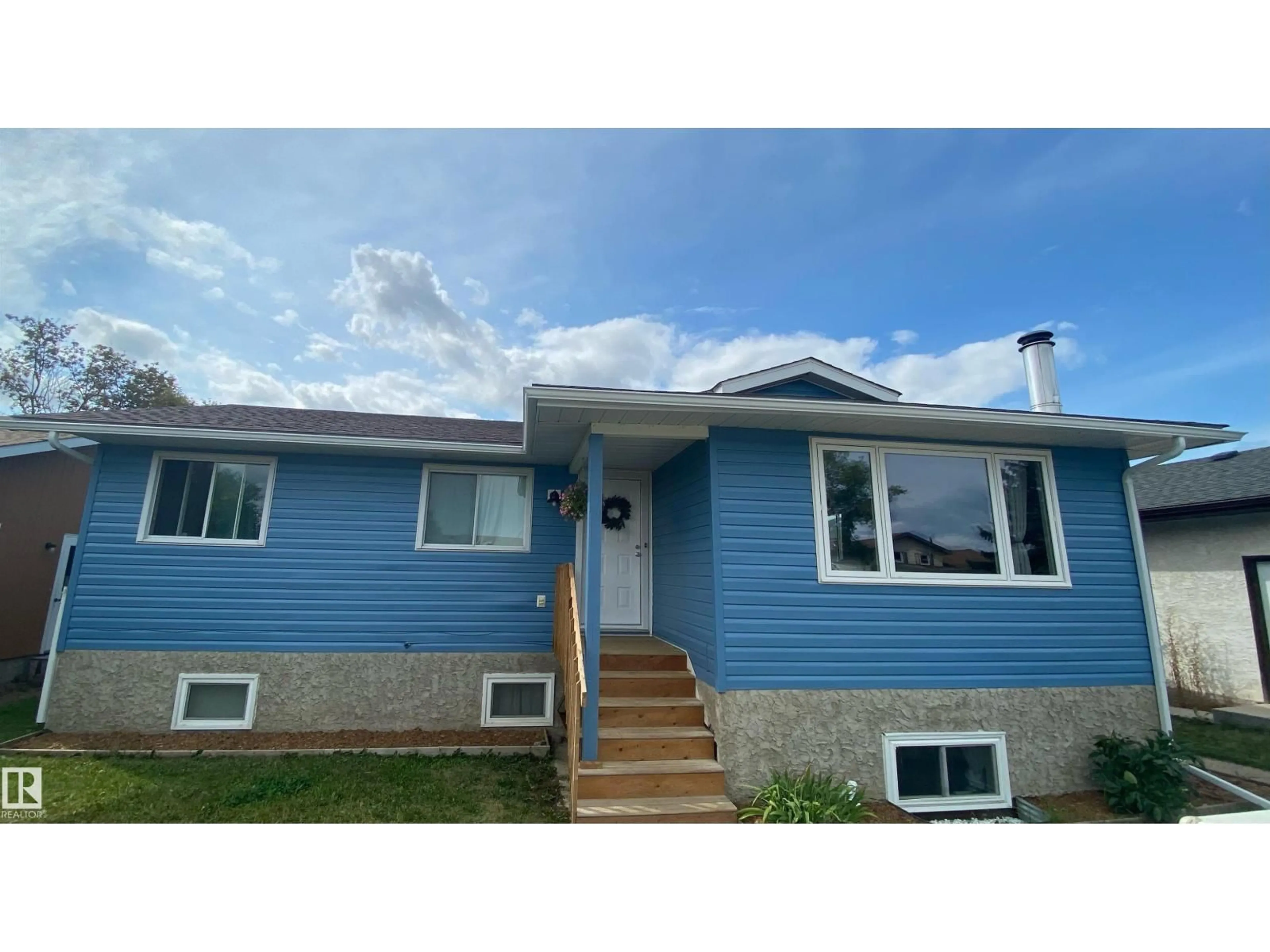 Home with vinyl exterior material, street for 5030 40 ST, Cold Lake Alberta T9M2A7